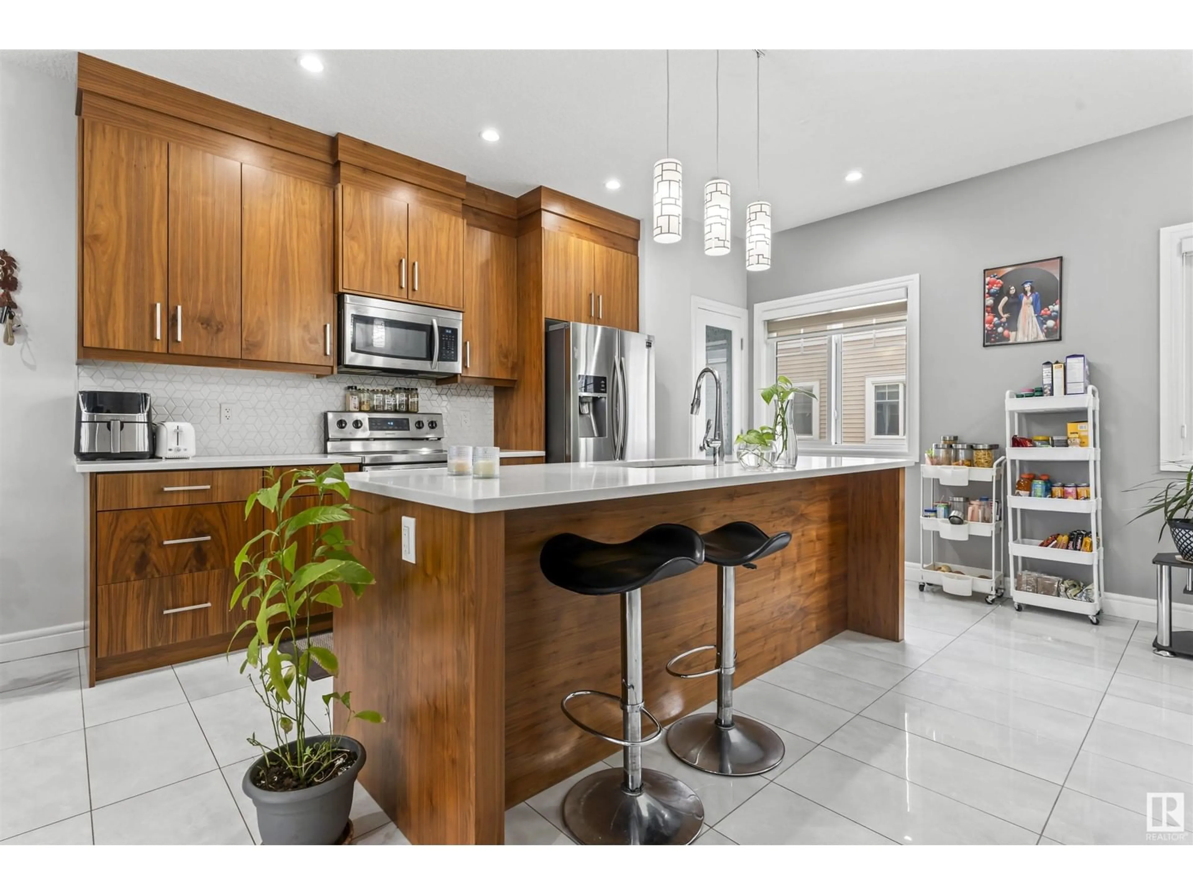 Open concept kitchen, ceramic/tile floor for #38 2803 14 AV NW, Edmonton Alberta T6T2K4