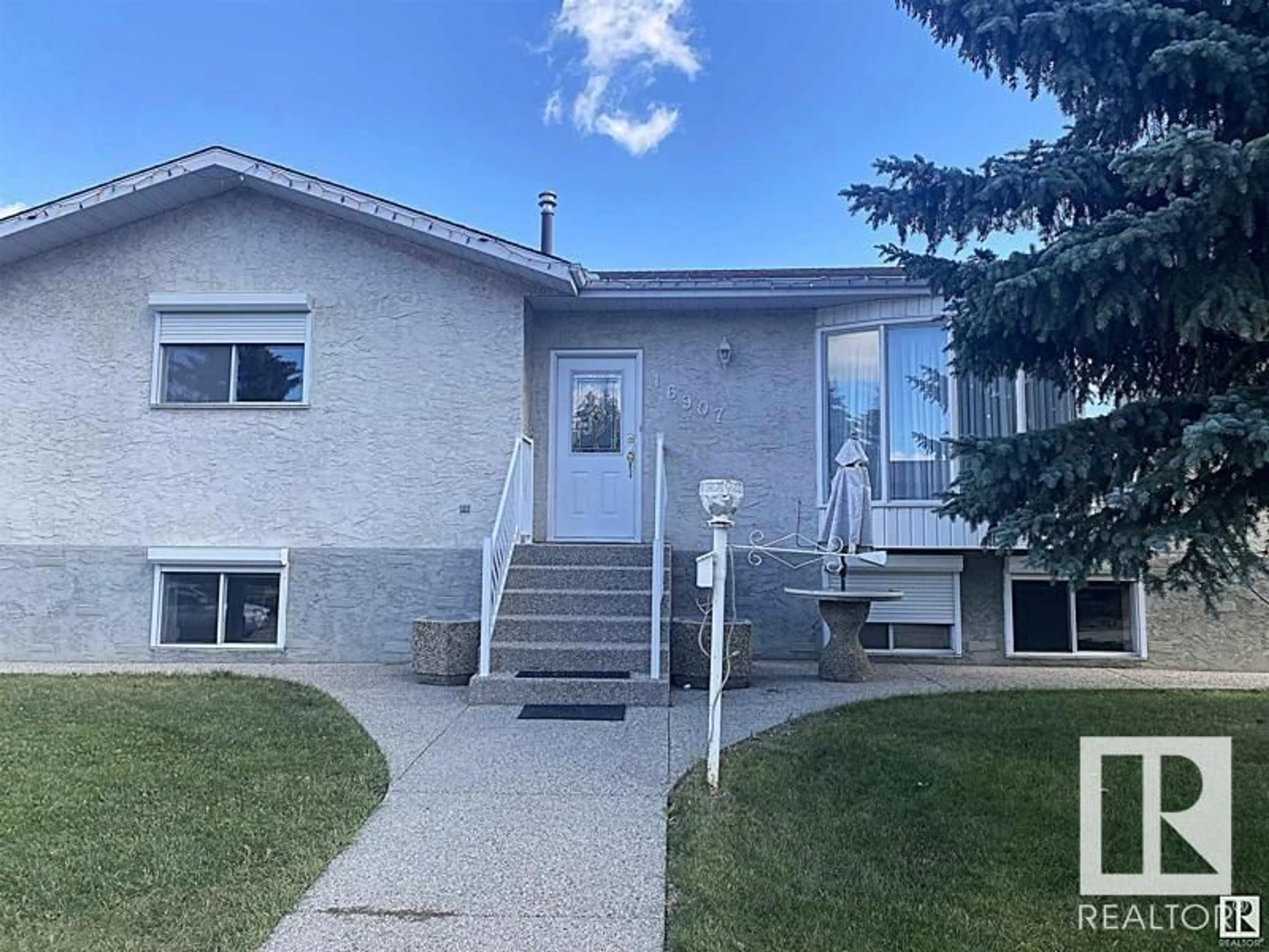 Home with vinyl exterior material, street for NW - 16907 93 ST, Edmonton Alberta T5Z1X5