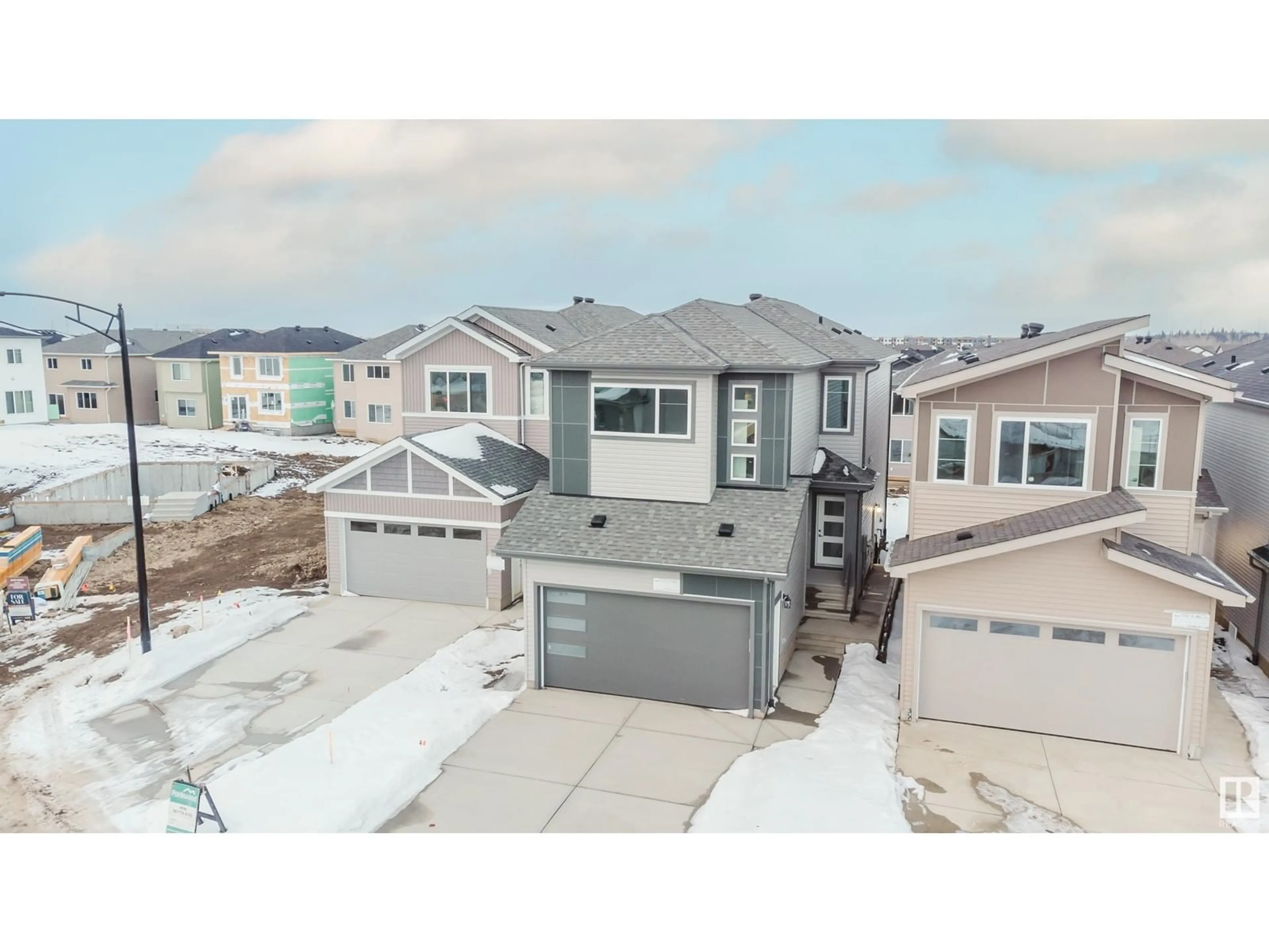 A pic from outside/outdoor area/front of a property/back of a property/a pic from drone, street for 1320 11 AV NW, Edmonton Alberta T6T2W3