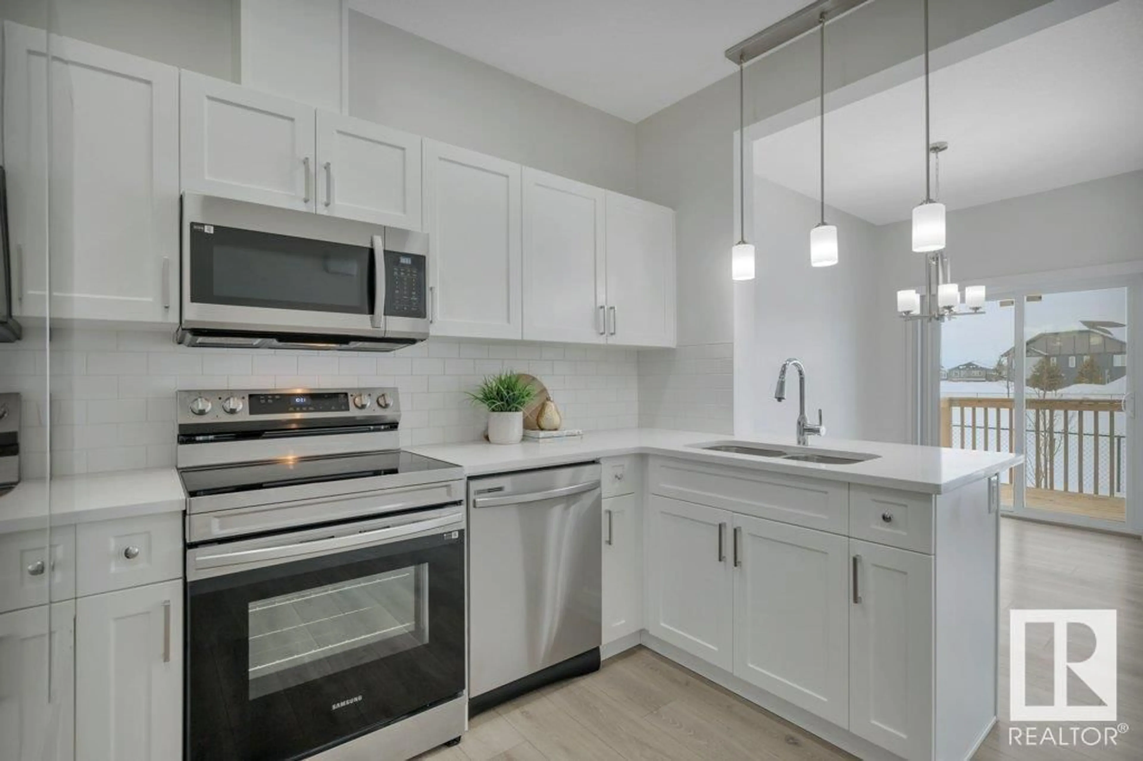 Standard kitchen, ceramic/tile floor for #35 603 Orchards BV SW, Edmonton Alberta T6X2W8