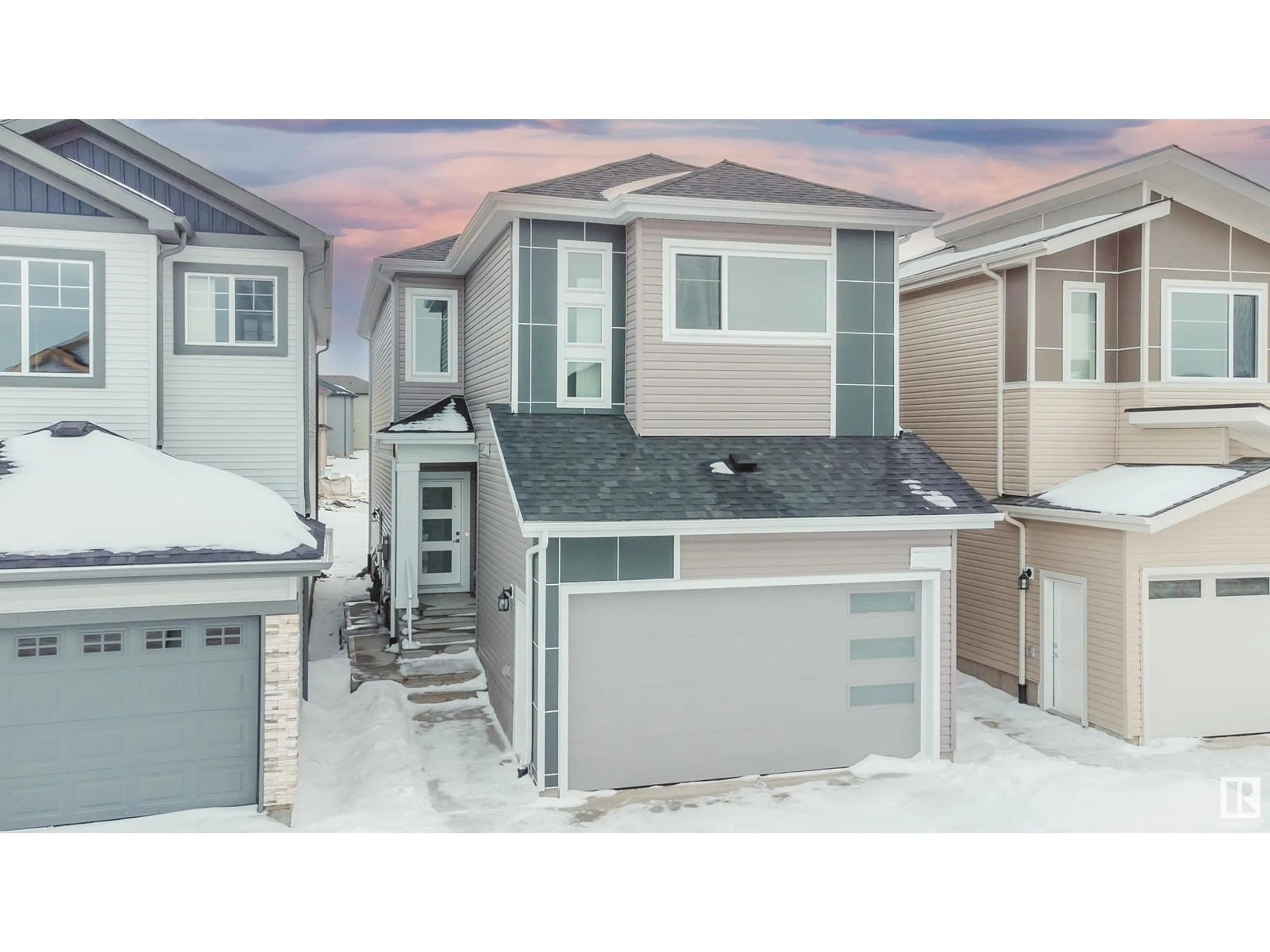 Home with vinyl exterior material, street for 1223 14 AV NW, Edmonton Alberta T6T2W2