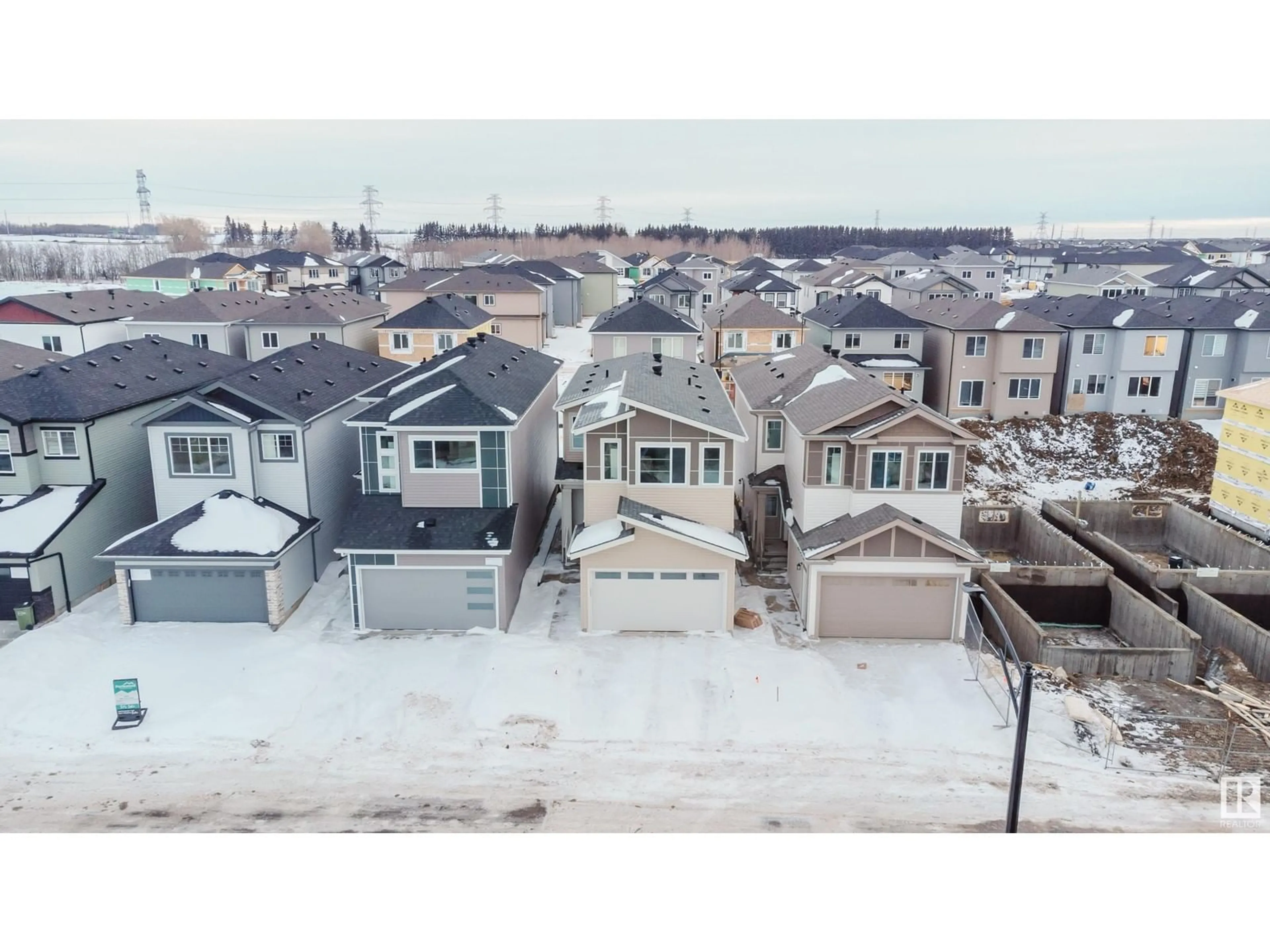 A pic from outside/outdoor area/front of a property/back of a property/a pic from drone, street for 1227 14 AV NW, Edmonton Alberta T6T2W2