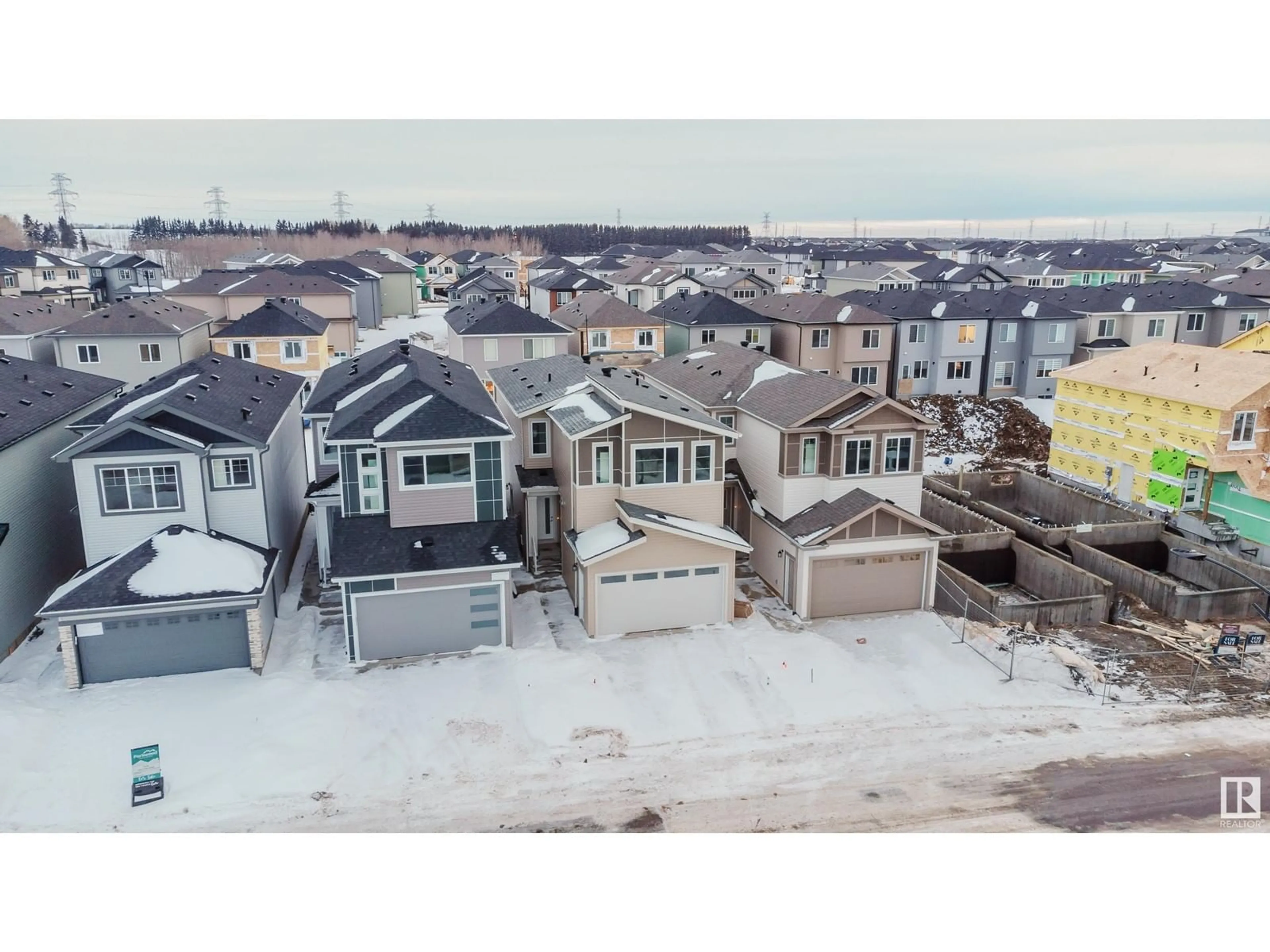 A pic from outside/outdoor area/front of a property/back of a property/a pic from drone, street for 1227 14 AV NW, Edmonton Alberta T6T2W2