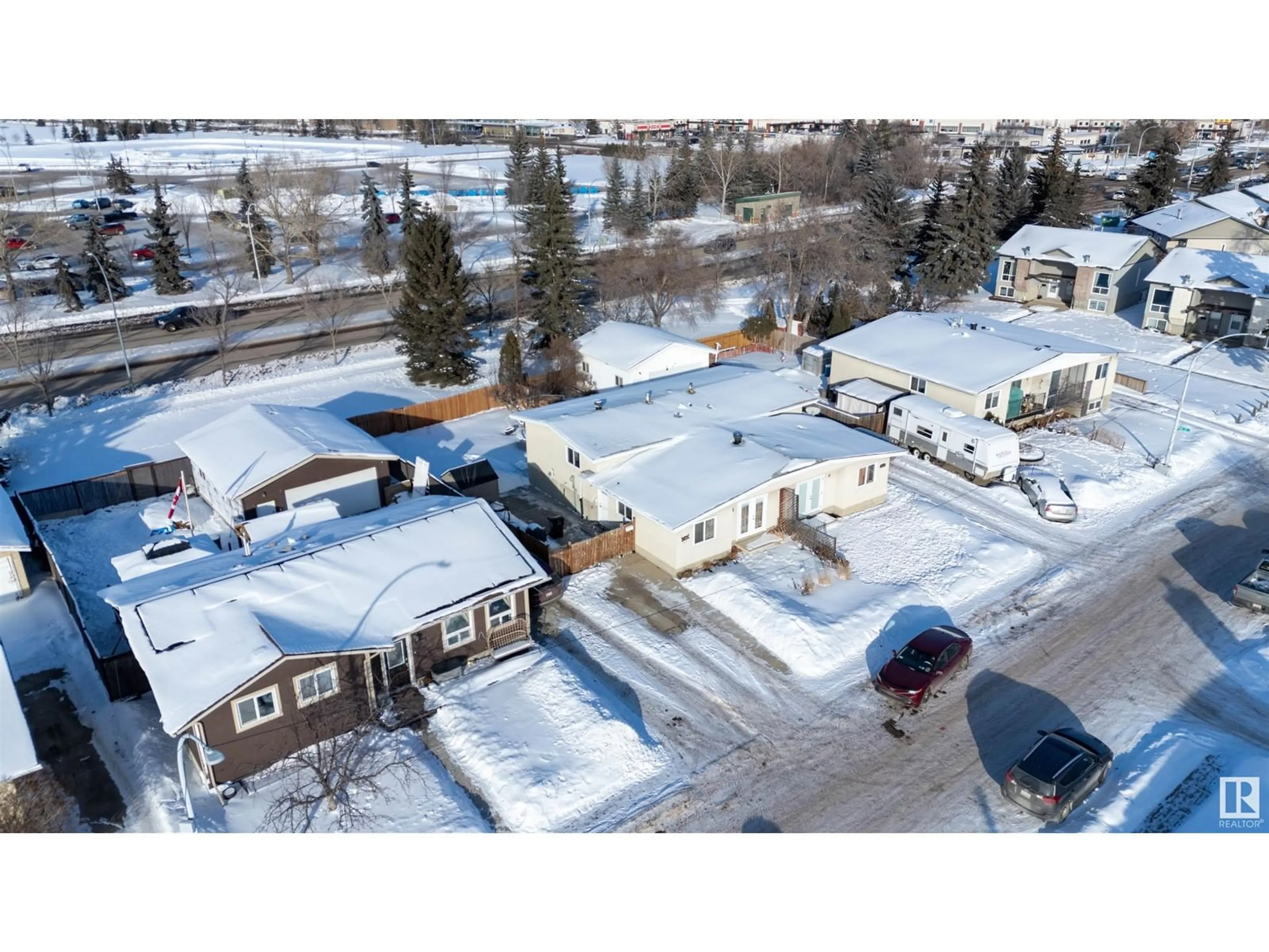 A pic from outside/outdoor area/front of a property/back of a property/a pic from drone, street for 11456 152B AV NW, Edmonton Alberta T5X1E8