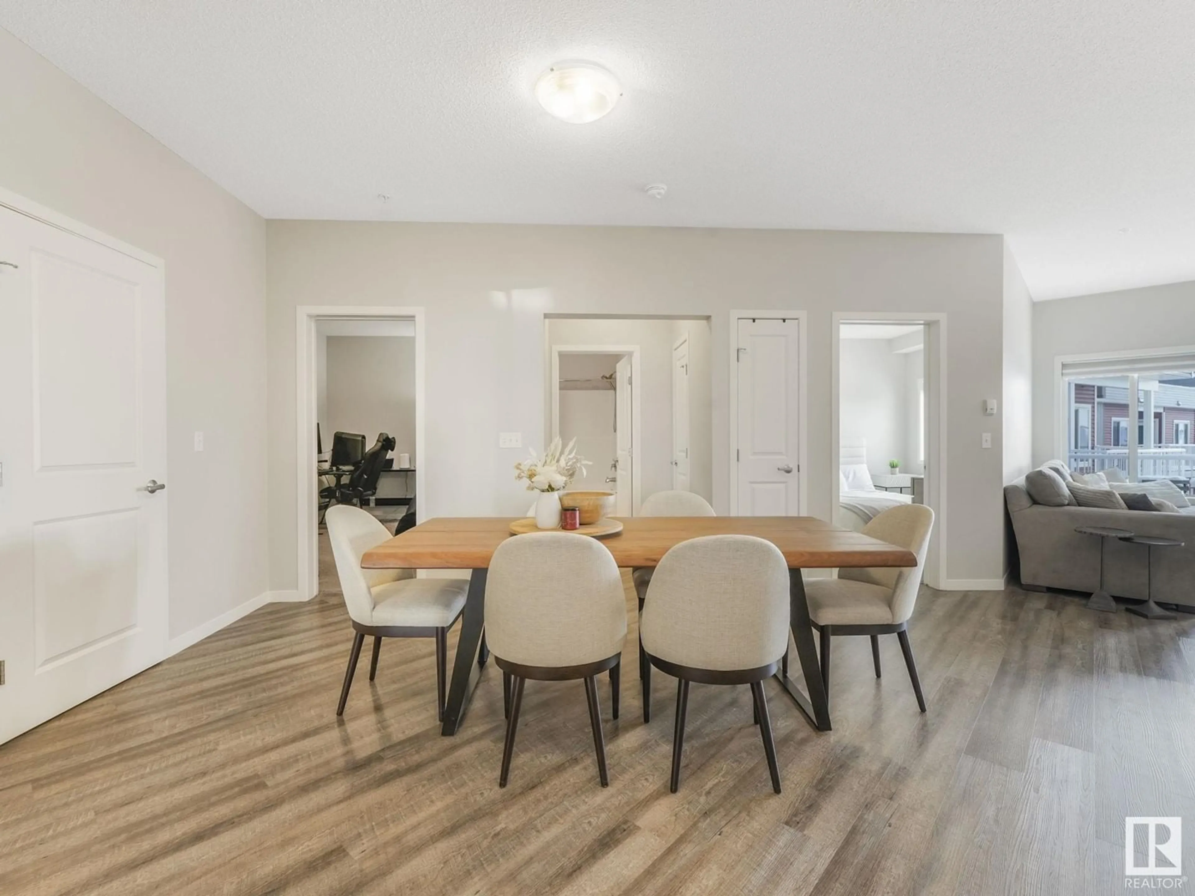 Dining room, wood/laminate floor for #433 1818 RUTHERFORD RD SW, Edmonton Alberta T6W2K6