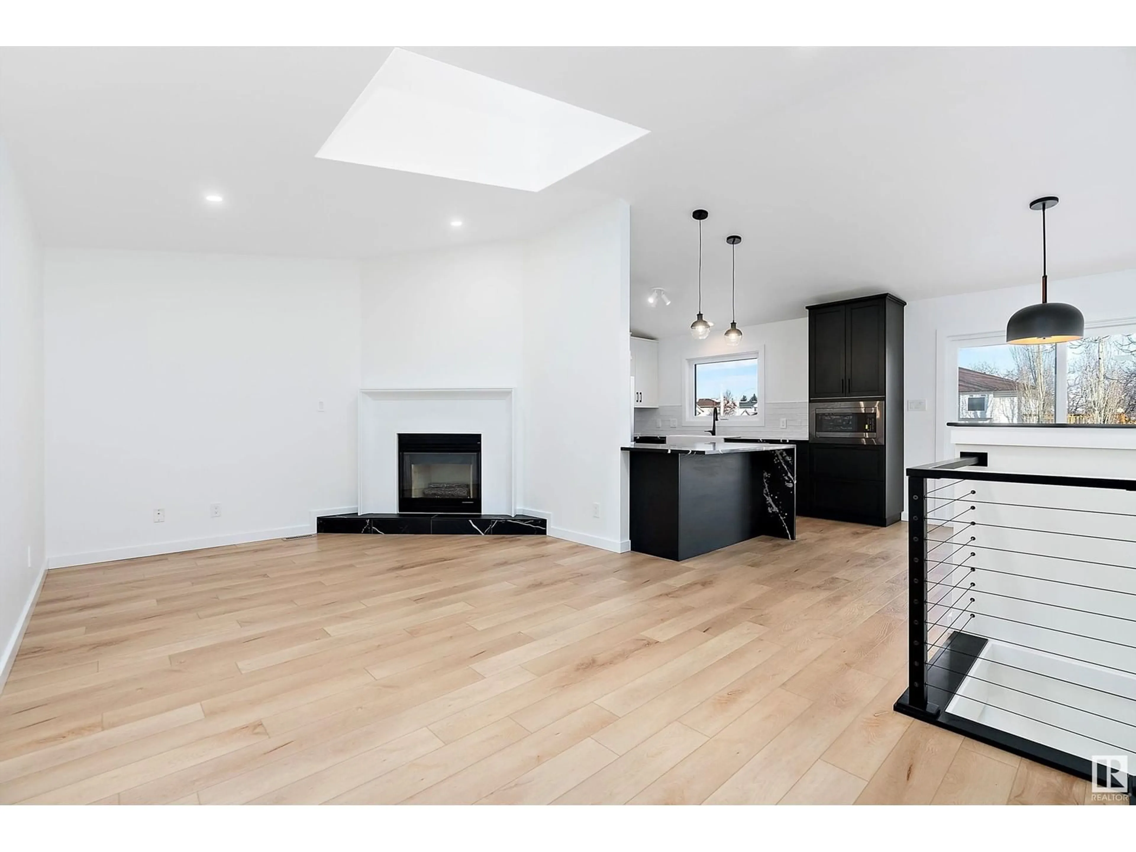 Open concept kitchen, wood/laminate floor for 49 JACKSON RD NW, Edmonton Alberta T6L6S7