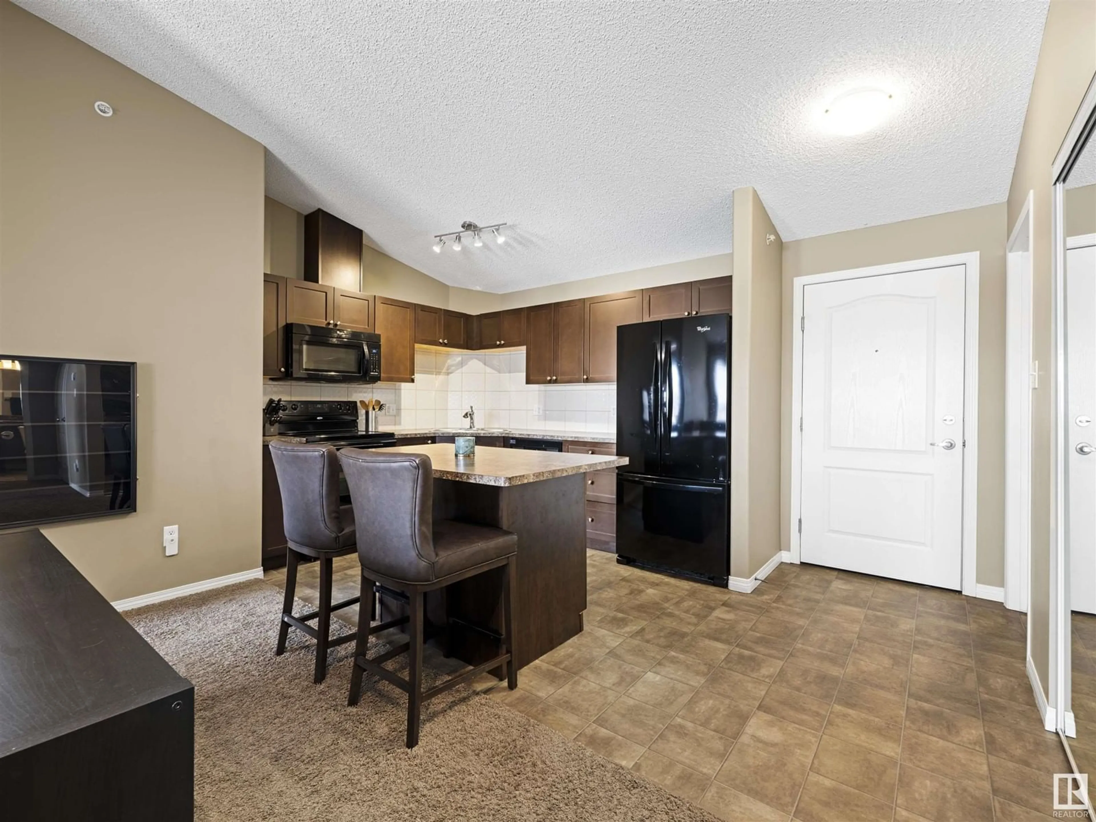 Open concept kitchen, unknown for #409 1520 HAMMOND GA NW, Edmonton Alberta T6M0J4