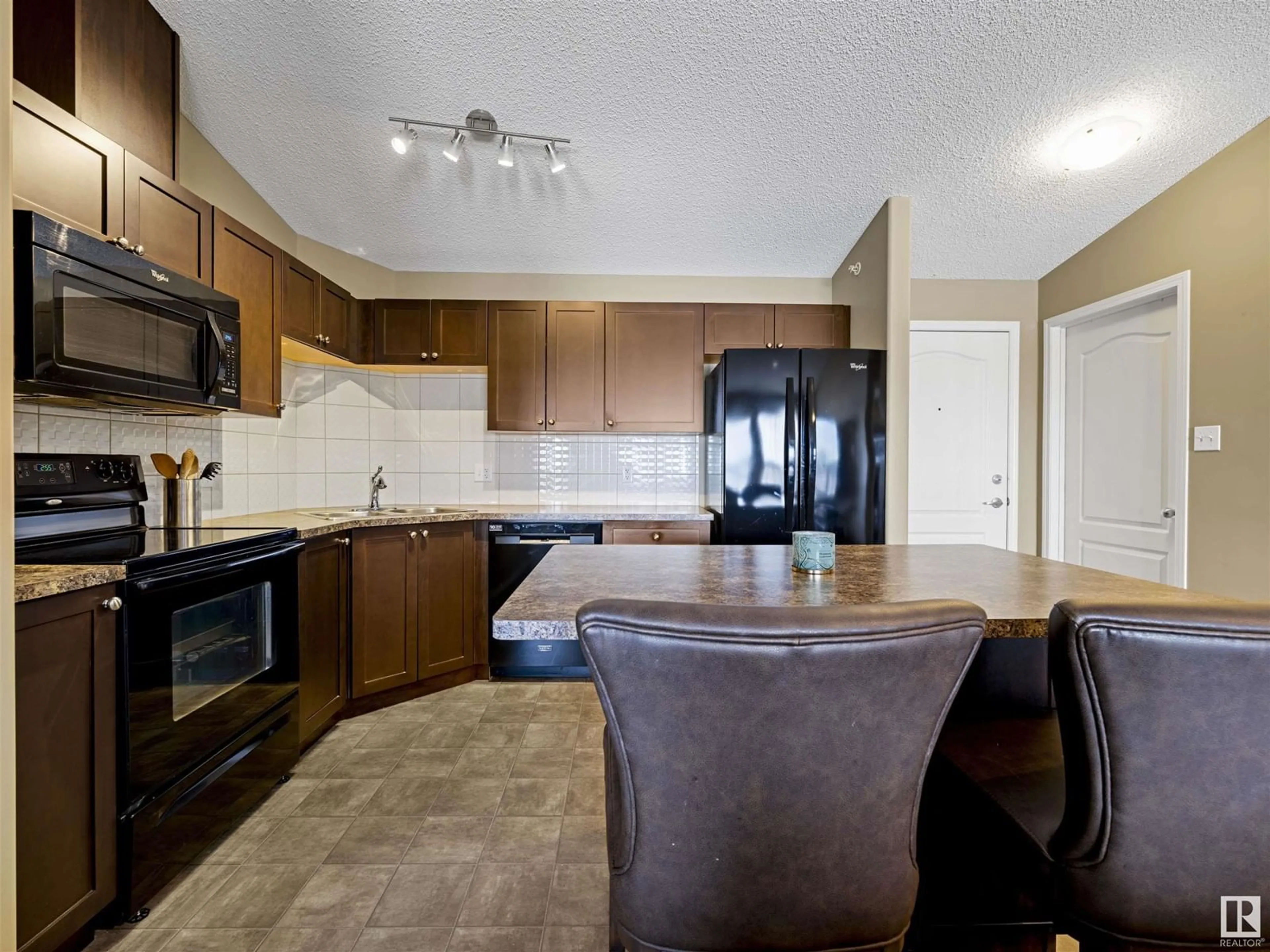 Open concept kitchen, unknown for #409 1520 HAMMOND GA NW, Edmonton Alberta T6M0J4