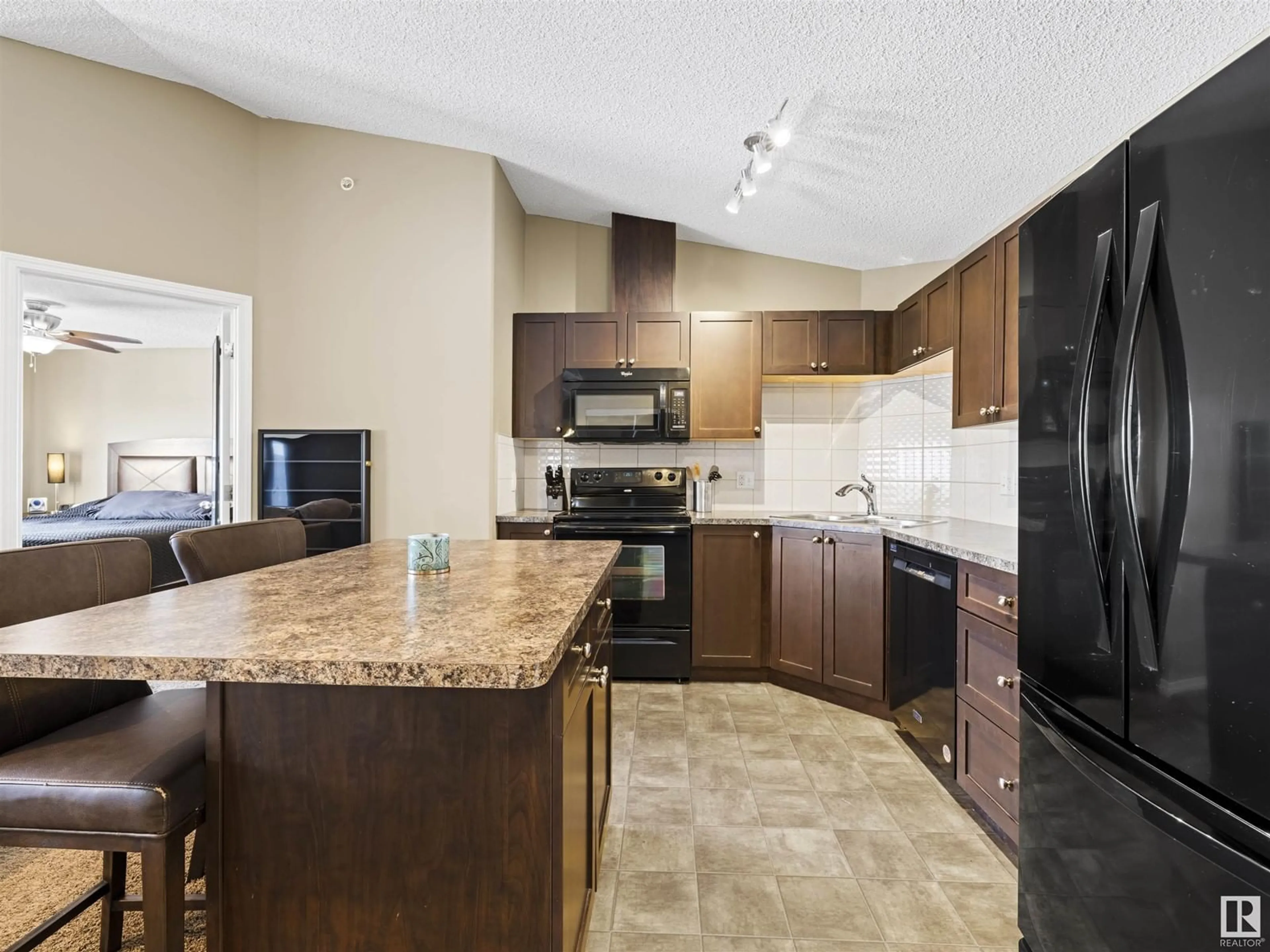 Open concept kitchen, ceramic/tile floor for #409 1520 HAMMOND GA NW, Edmonton Alberta T6M0J4