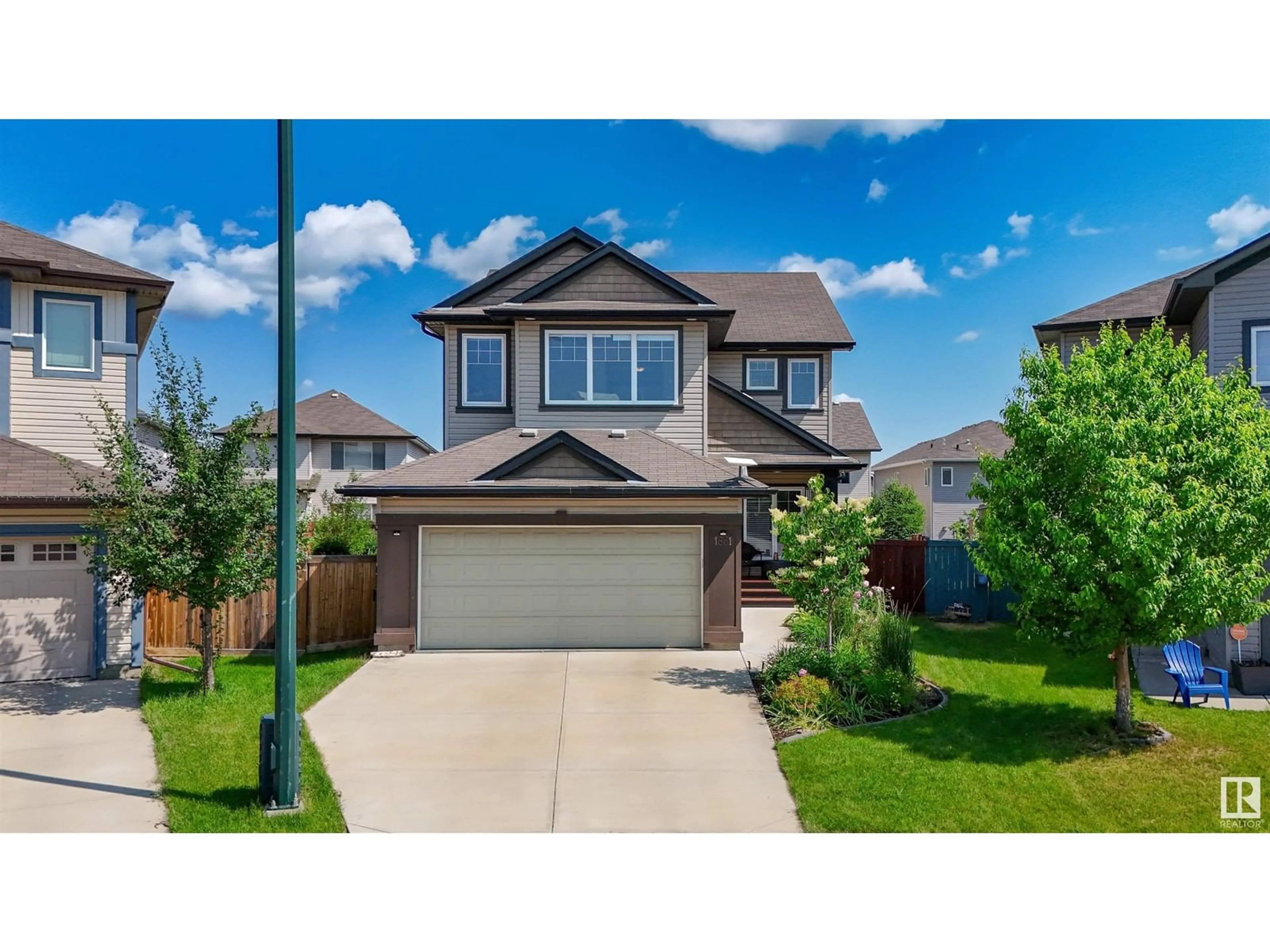 Home with vinyl exterior material, street for 1661 Rutherford Road SW SW, Edmonton Alberta T6W2E5