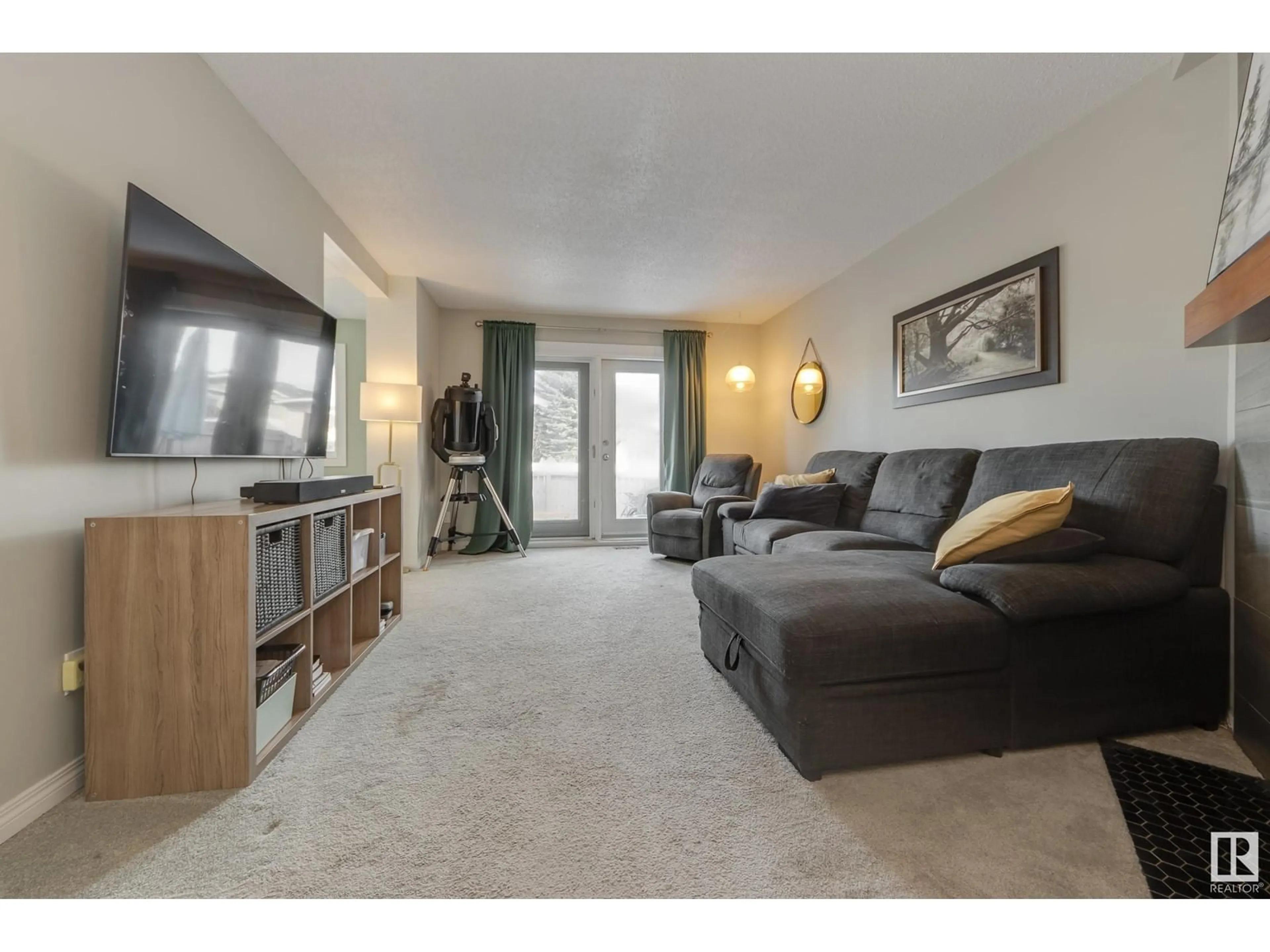 Living room with furniture, unknown for 13413 43 ST NW, Edmonton Alberta T5A2Y7