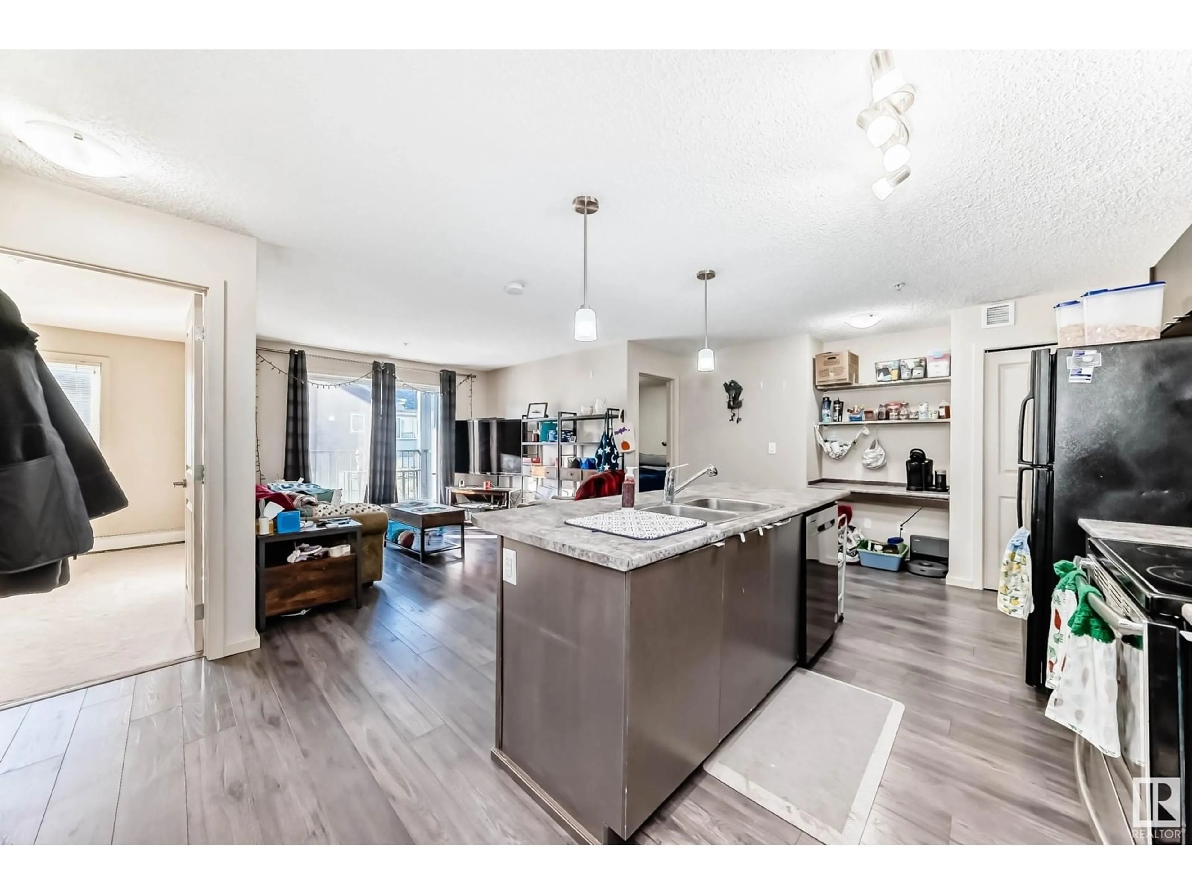 Open concept kitchen, unknown for #305 3353 16A AV NW, Edmonton Alberta T6T0V4