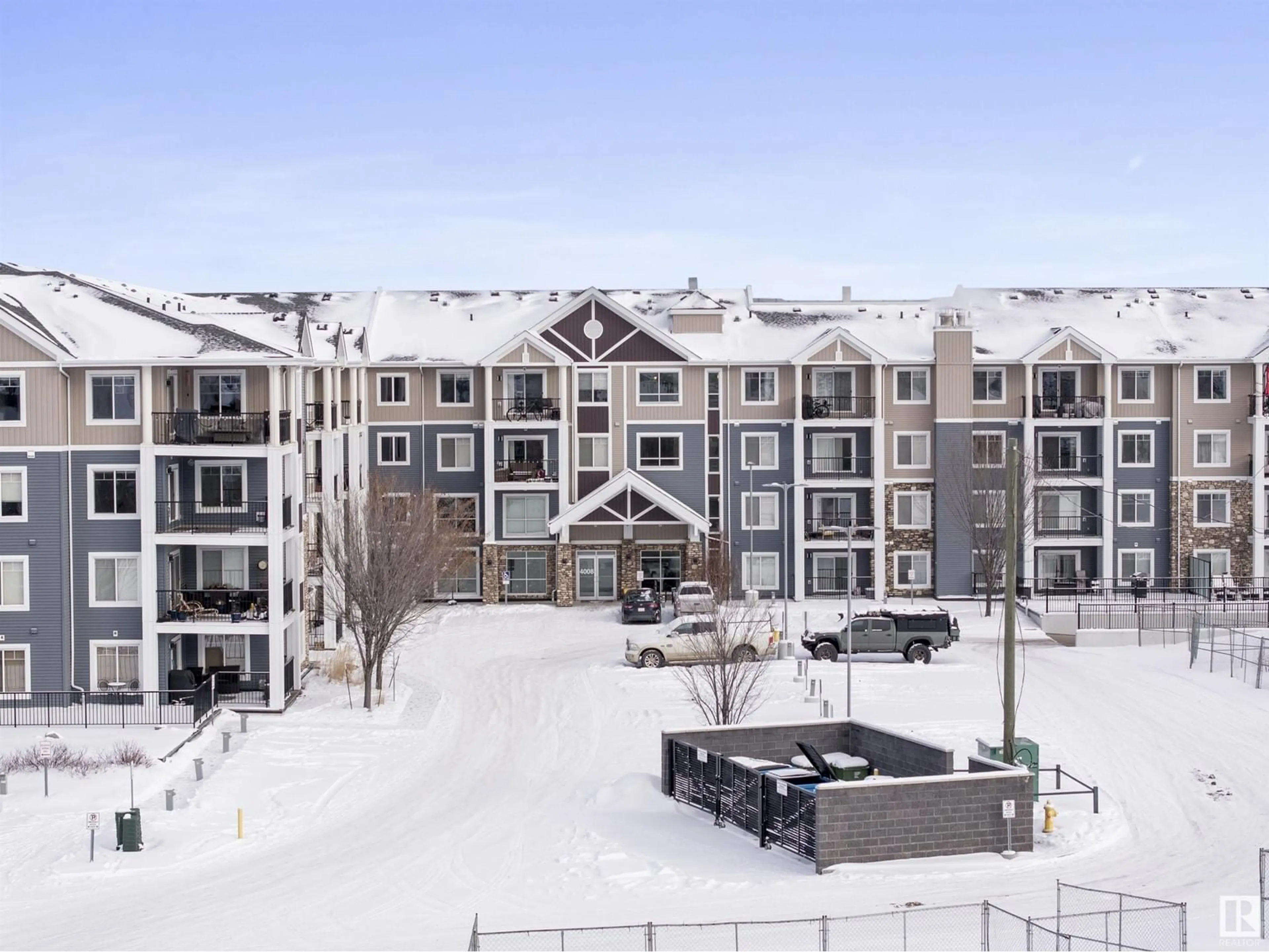A pic from outside/outdoor area/front of a property/back of a property/a pic from drone, mountain view for 205 - 4008 SAVARYN DR, Edmonton Alberta T6X2E5