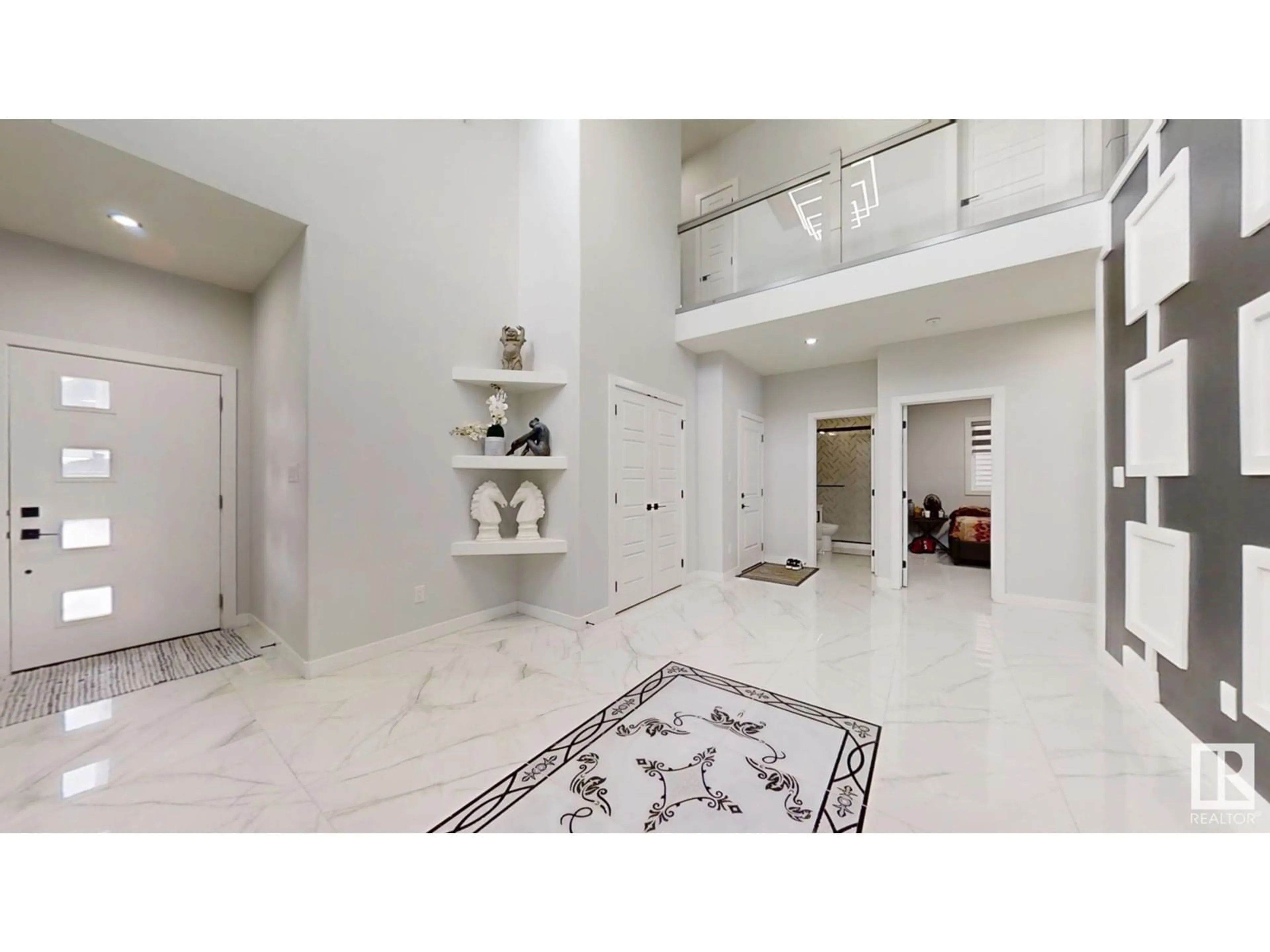 Indoor foyer for 2020 13 AV NW, Edmonton Alberta T6T2M7