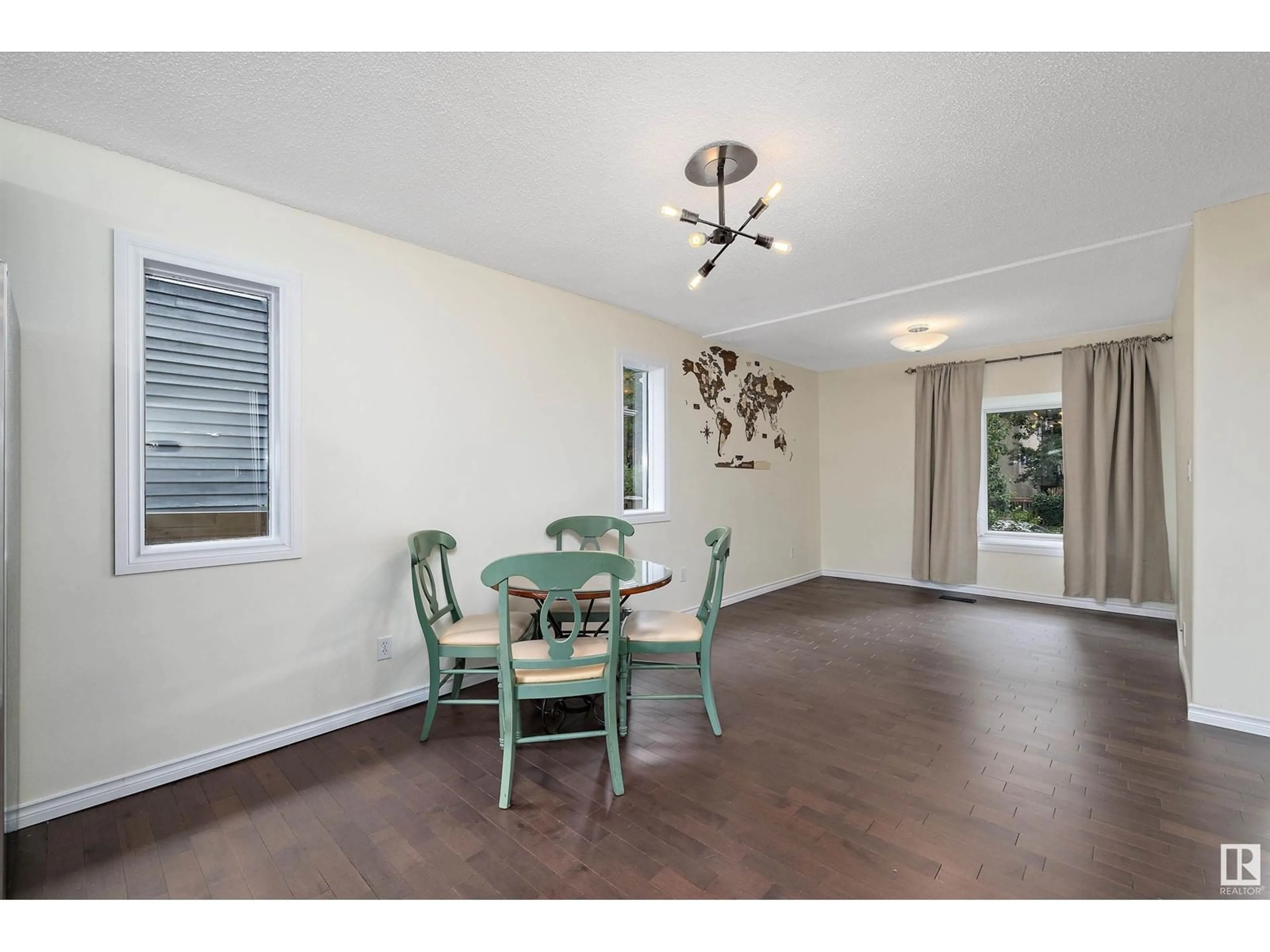 Dining room, wood/laminate floor for 11242 95A ST NW, Edmonton Alberta T5G1N8