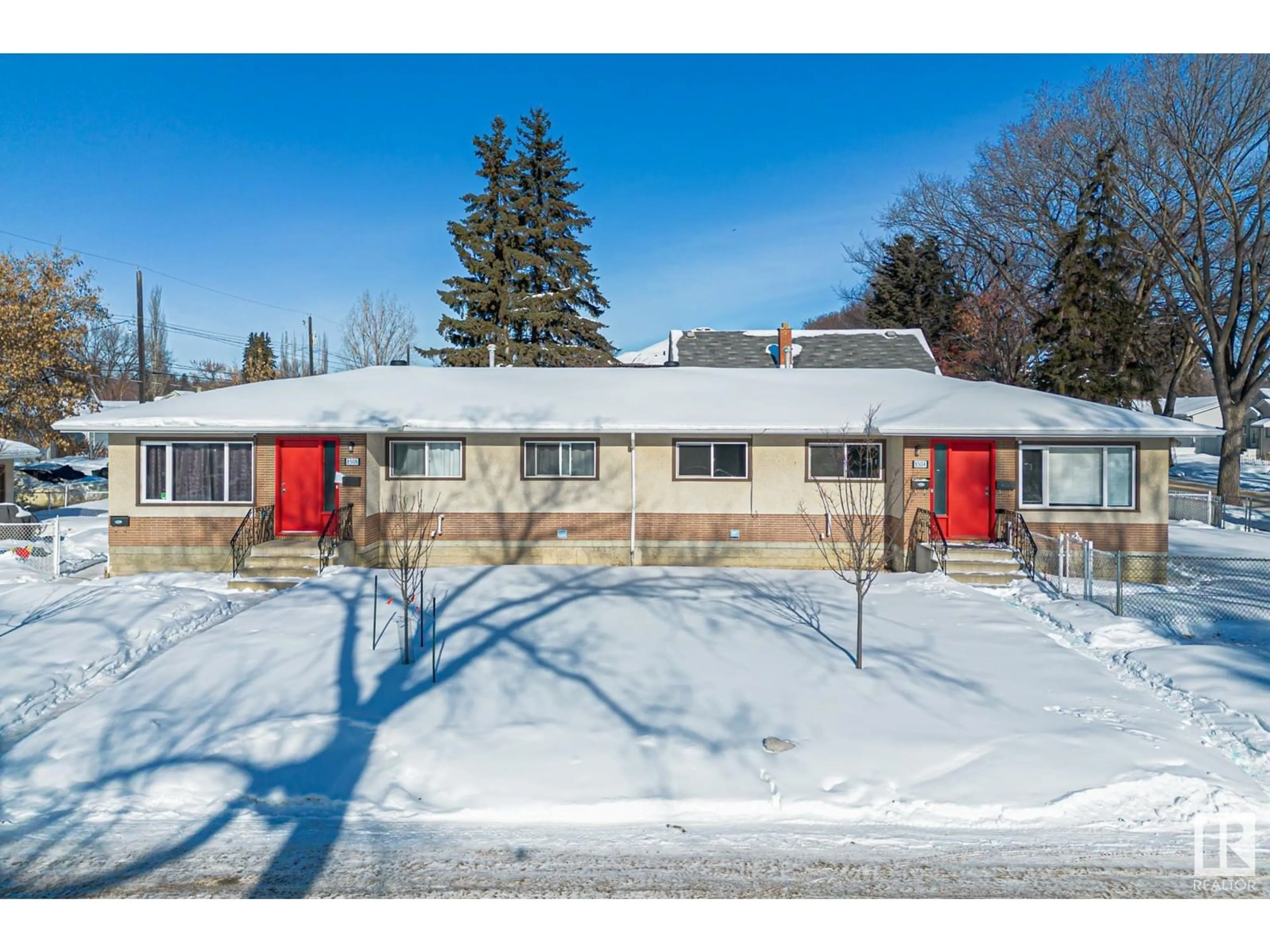 A pic from outside/outdoor area/front of a property/back of a property/a pic from drone, street for 8504 121 AV NW, Edmonton Alberta T5B0Z2