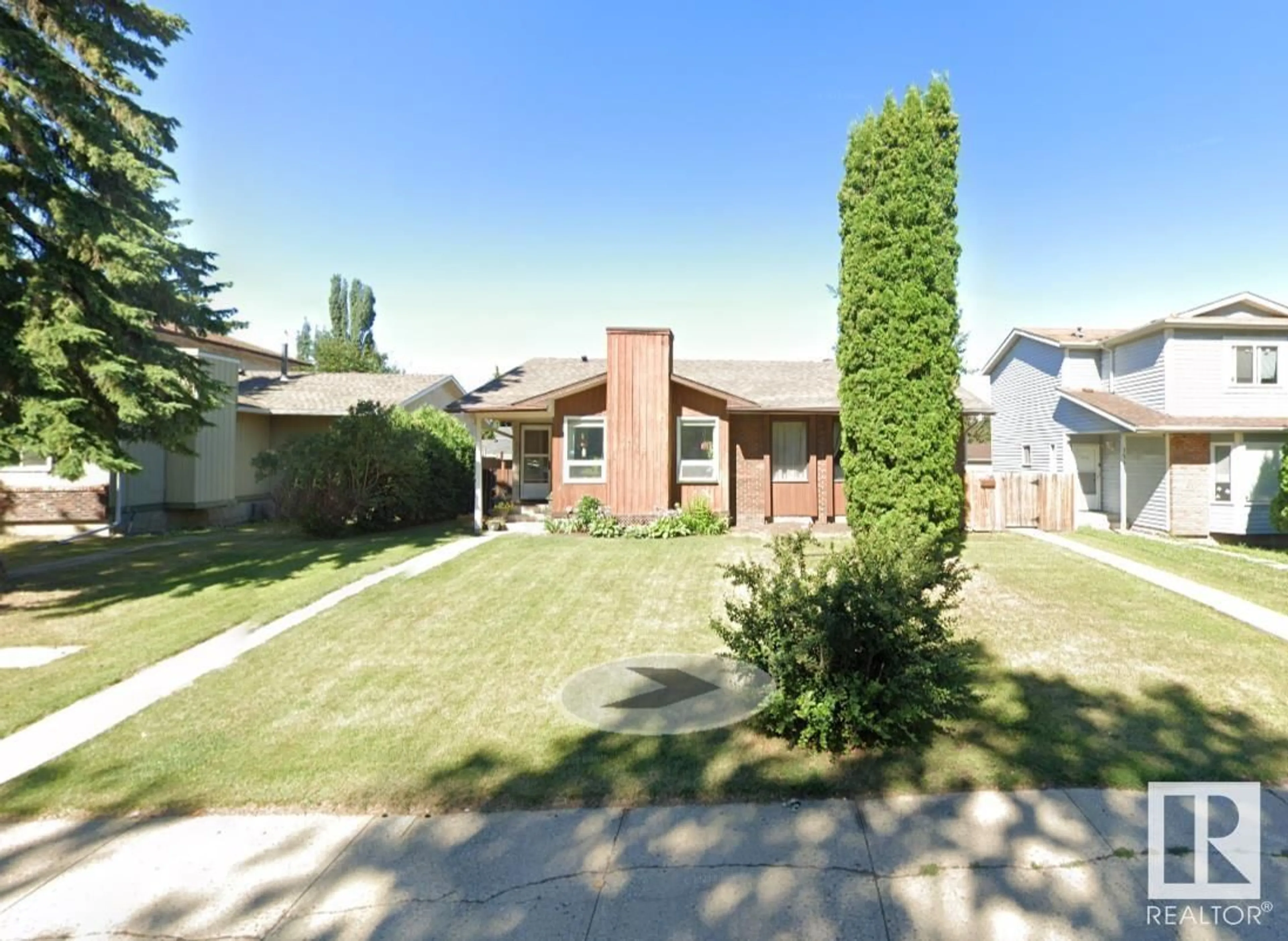 Home with brick exterior material, street for 1230 62 St NW, Edmonton Alberta T6L2H9