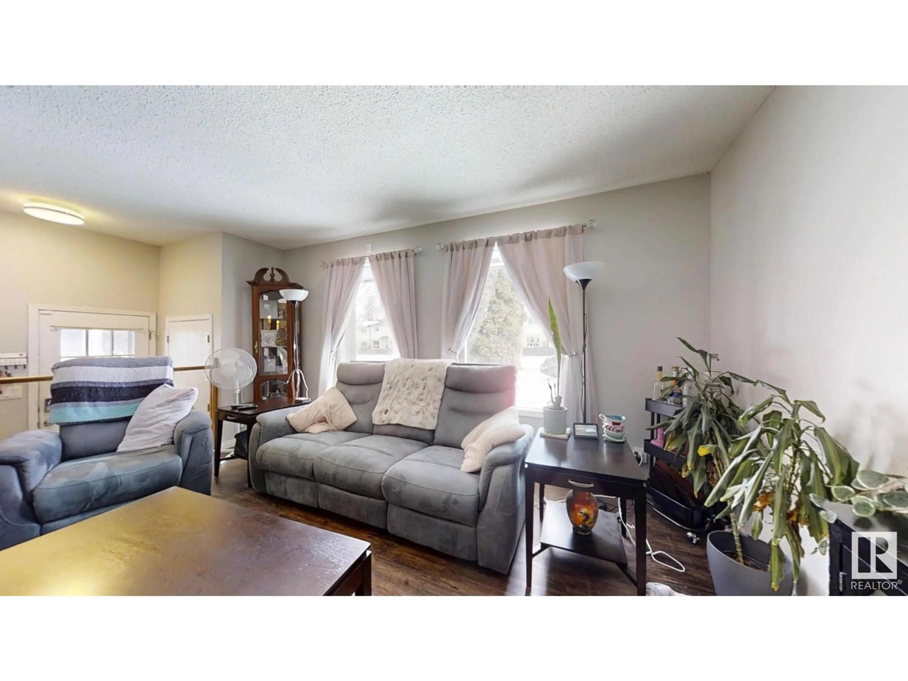 Living room with furniture, unknown for 1230 62 St NW, Edmonton Alberta T6L2H9