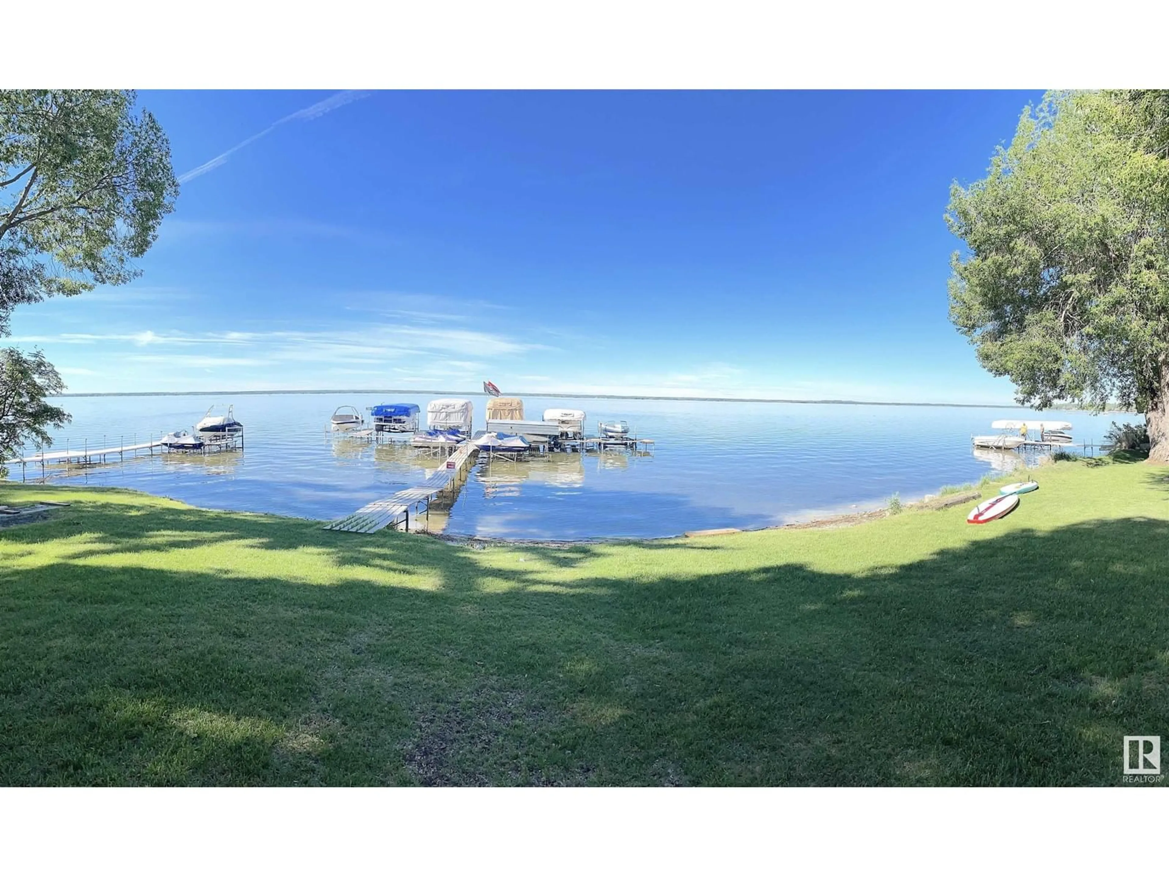 A pic from outside/outdoor area/front of a property/back of a property/a pic from drone, water/lake/river/ocean view for 309 3 ST, Rural Lac Ste. Anne County Alberta T0E1A0