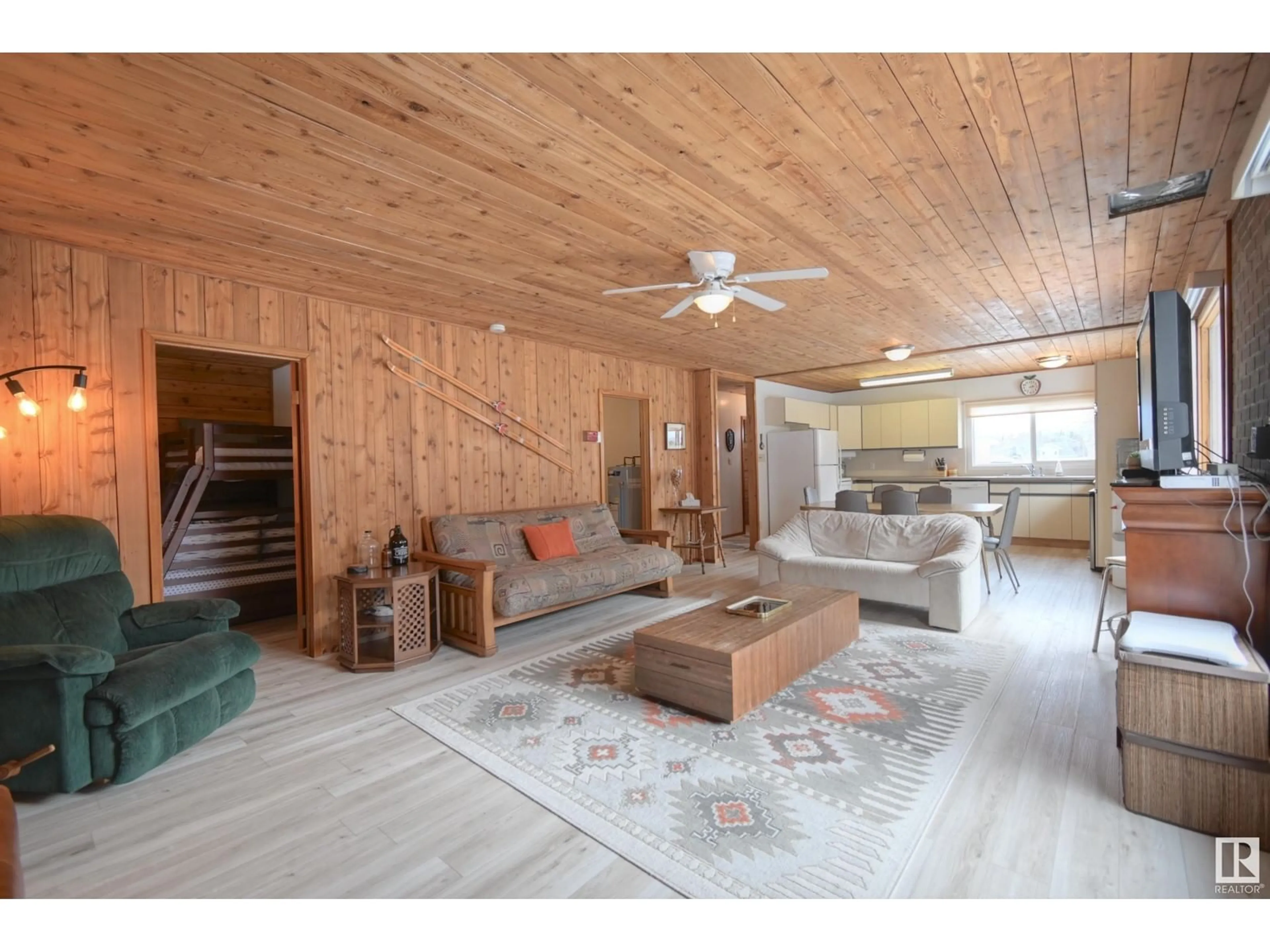 Living room with furniture, wood/laminate floor for 309 3 ST, Rural Lac Ste. Anne County Alberta T0E1A0