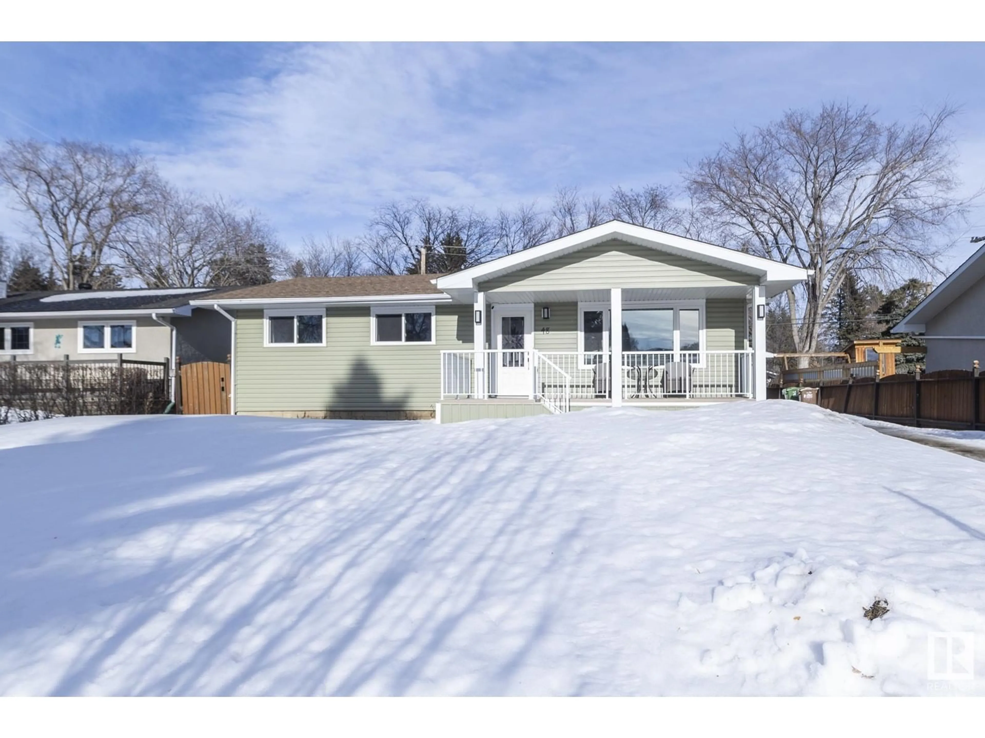 Home with vinyl exterior material, street for 48 SPRINGFIELD CR, St. Albert Alberta T8N0K1