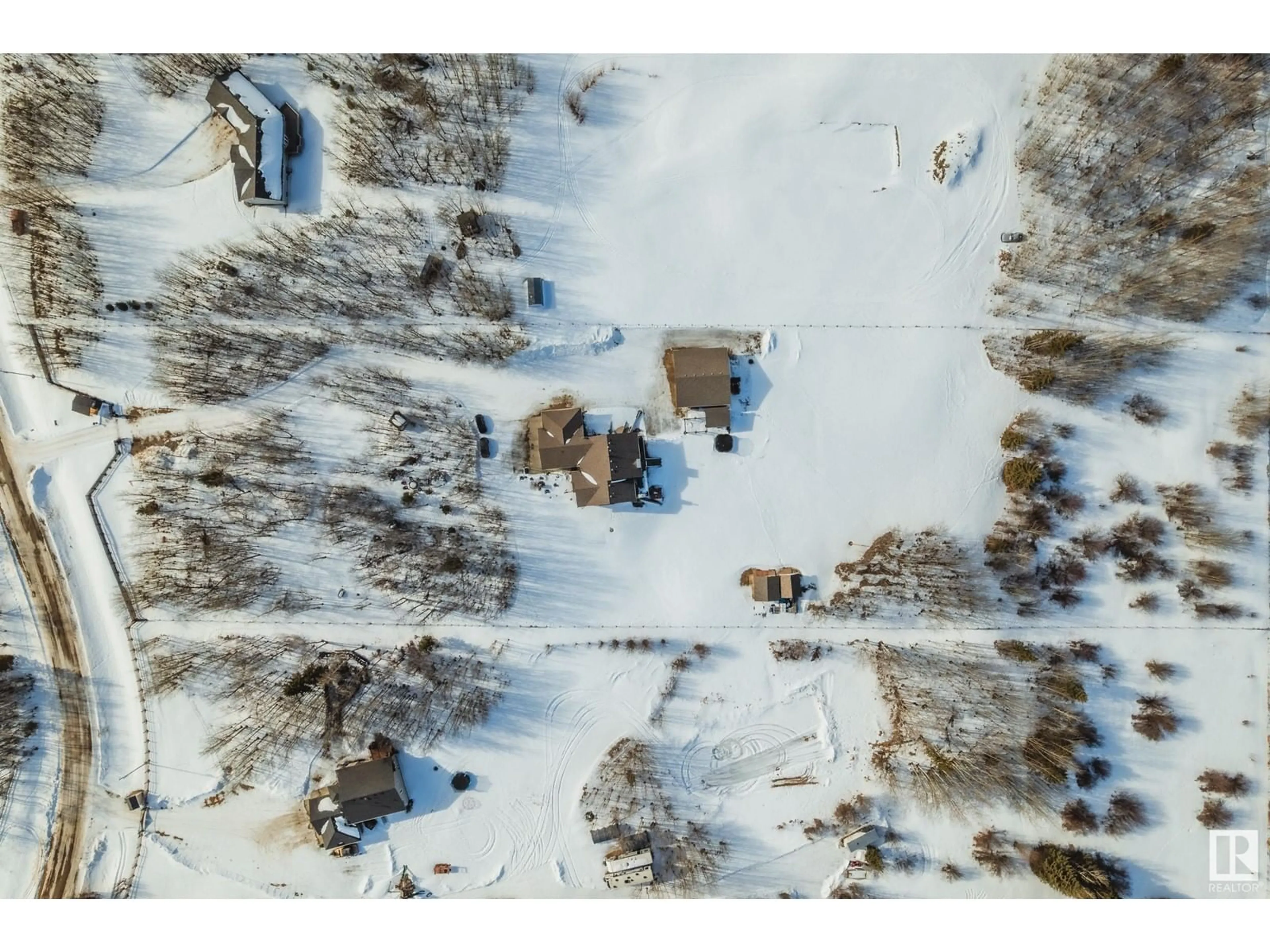 A pic from outside/outdoor area/front of a property/back of a property/a pic from drone, street for #229 52061 RGE ROAD 215, Rural Strathcona County Alberta T8E1B2