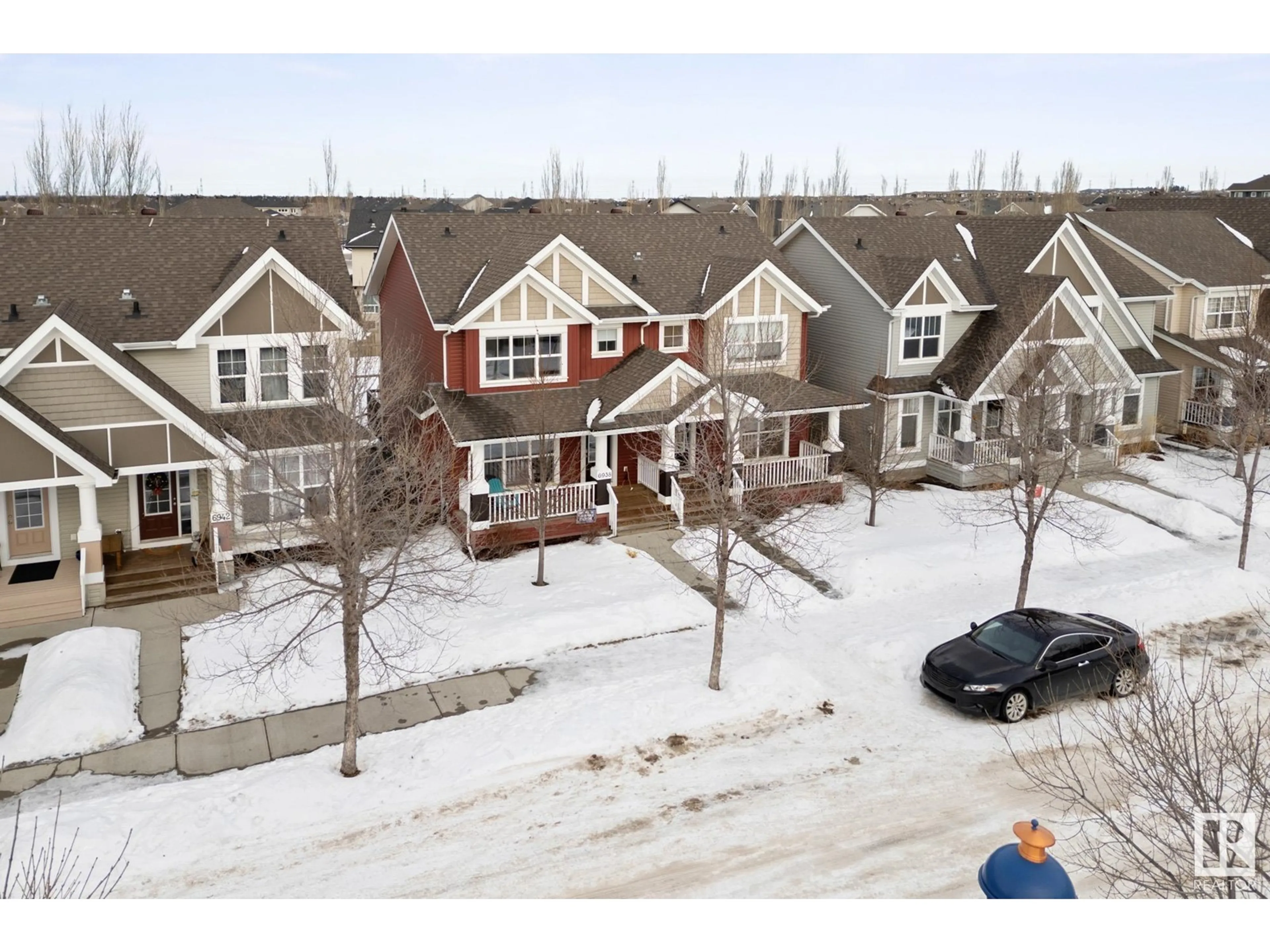 A pic from outside/outdoor area/front of a property/back of a property/a pic from drone, street for 6938 21A AV SW, Edmonton Alberta T6X0T6