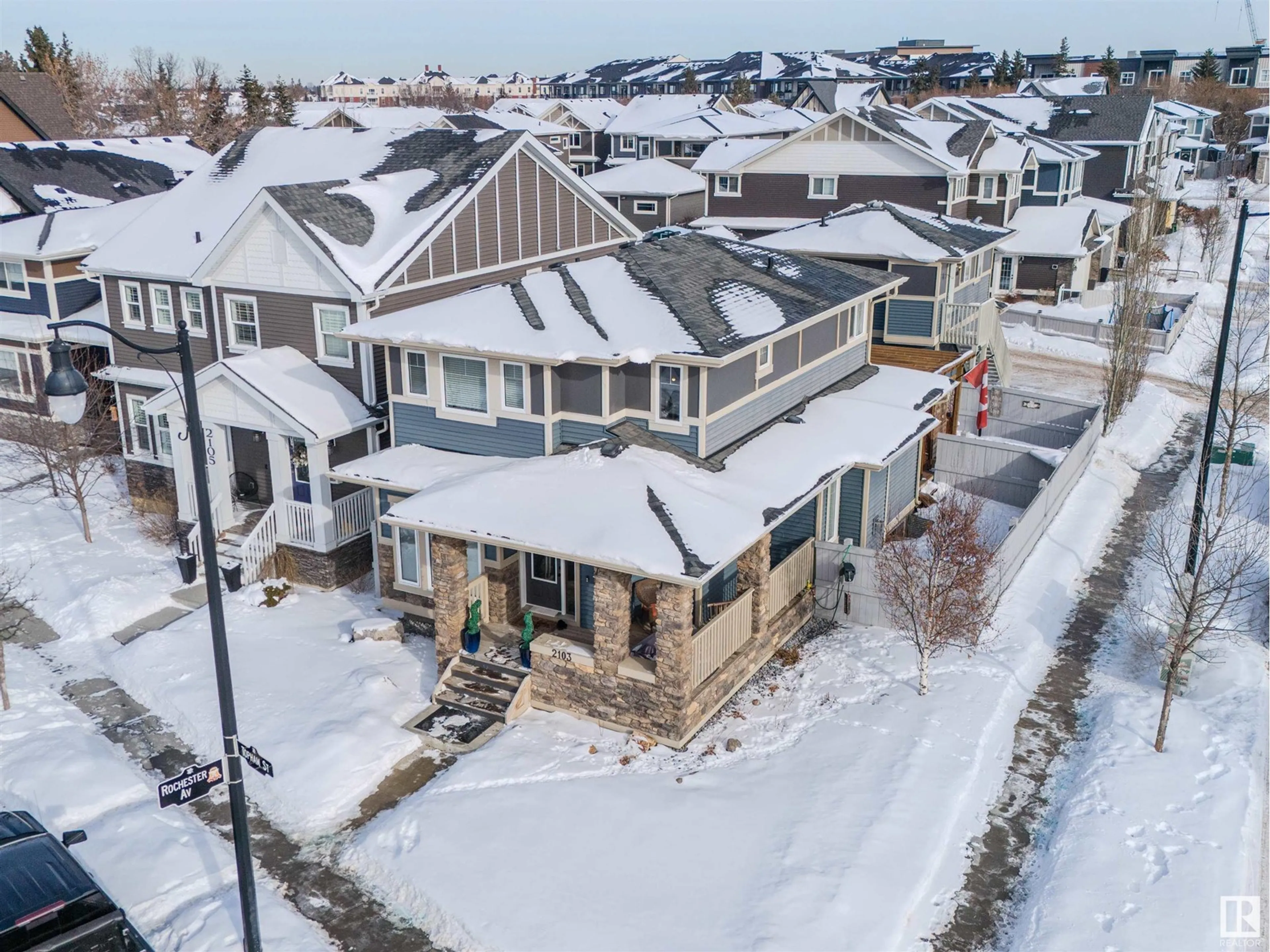 A pic from outside/outdoor area/front of a property/back of a property/a pic from drone, street for 2103 TOPHAM ST NW, Edmonton Alberta T5E6W2