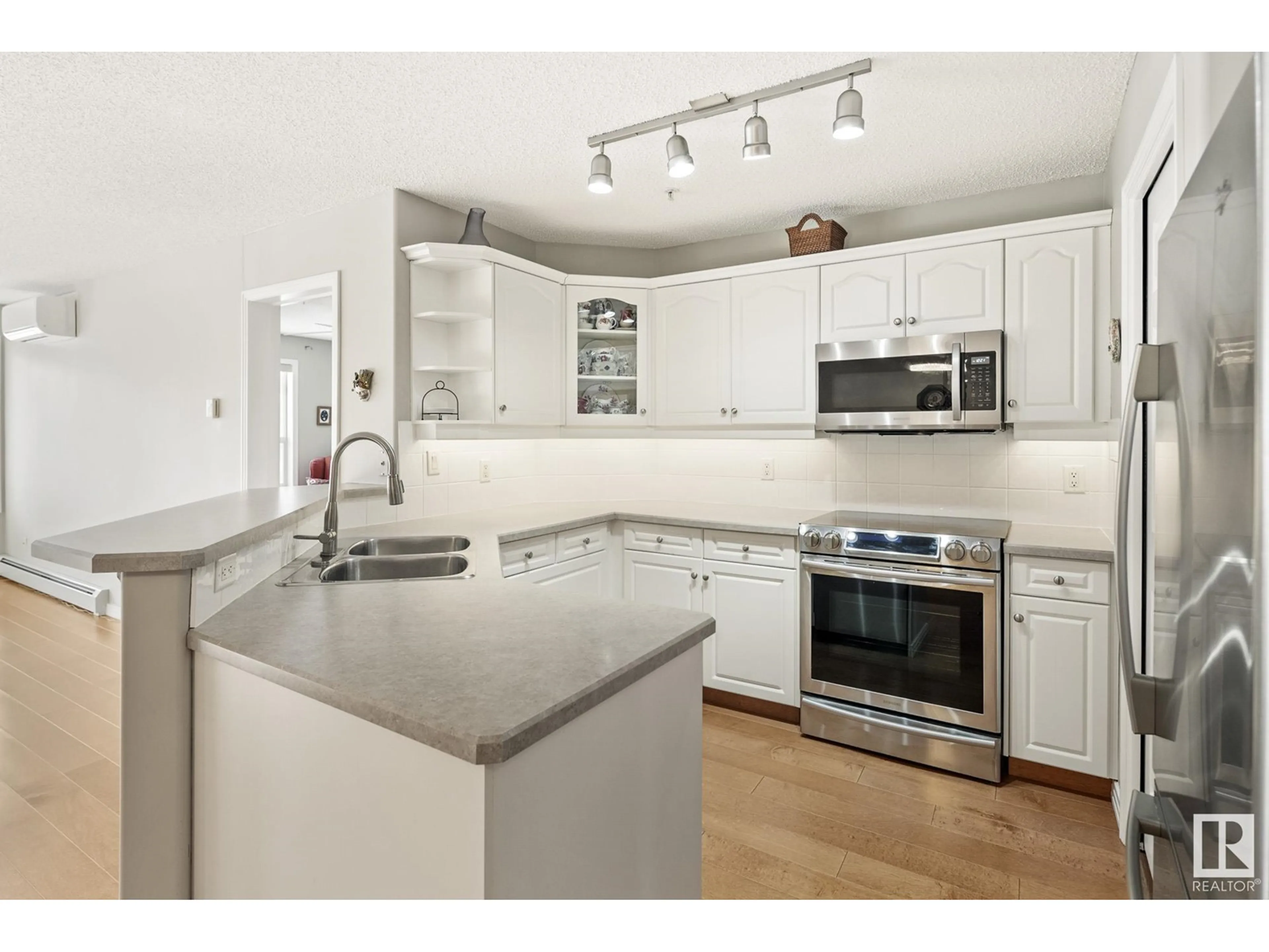 Open concept kitchen, ceramic/tile floor for #226 9730 174 ST NW, Edmonton Alberta T5T6J4