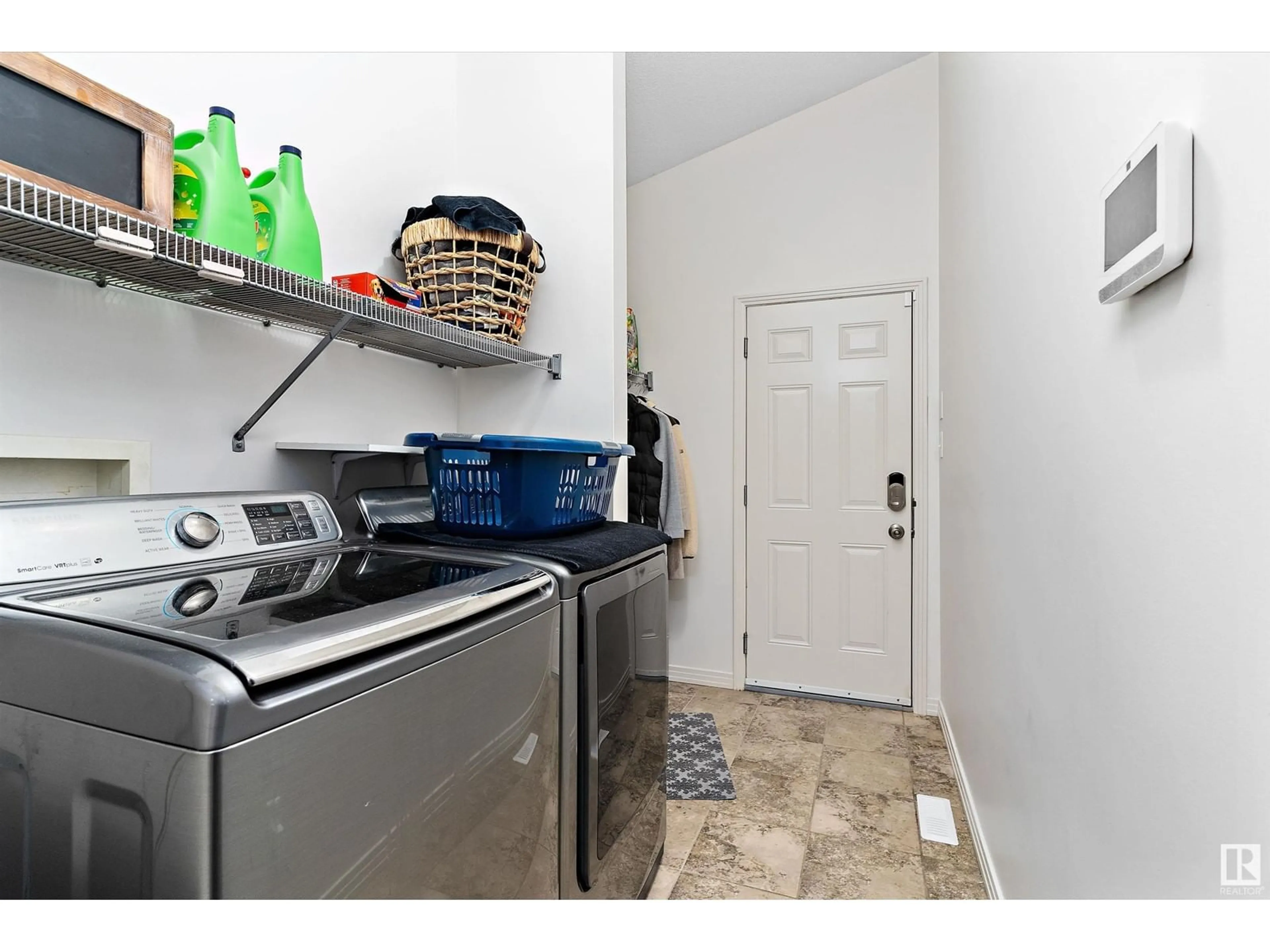 Laundry room for 7524 170 AV NW, Edmonton Alberta T5Z0B2