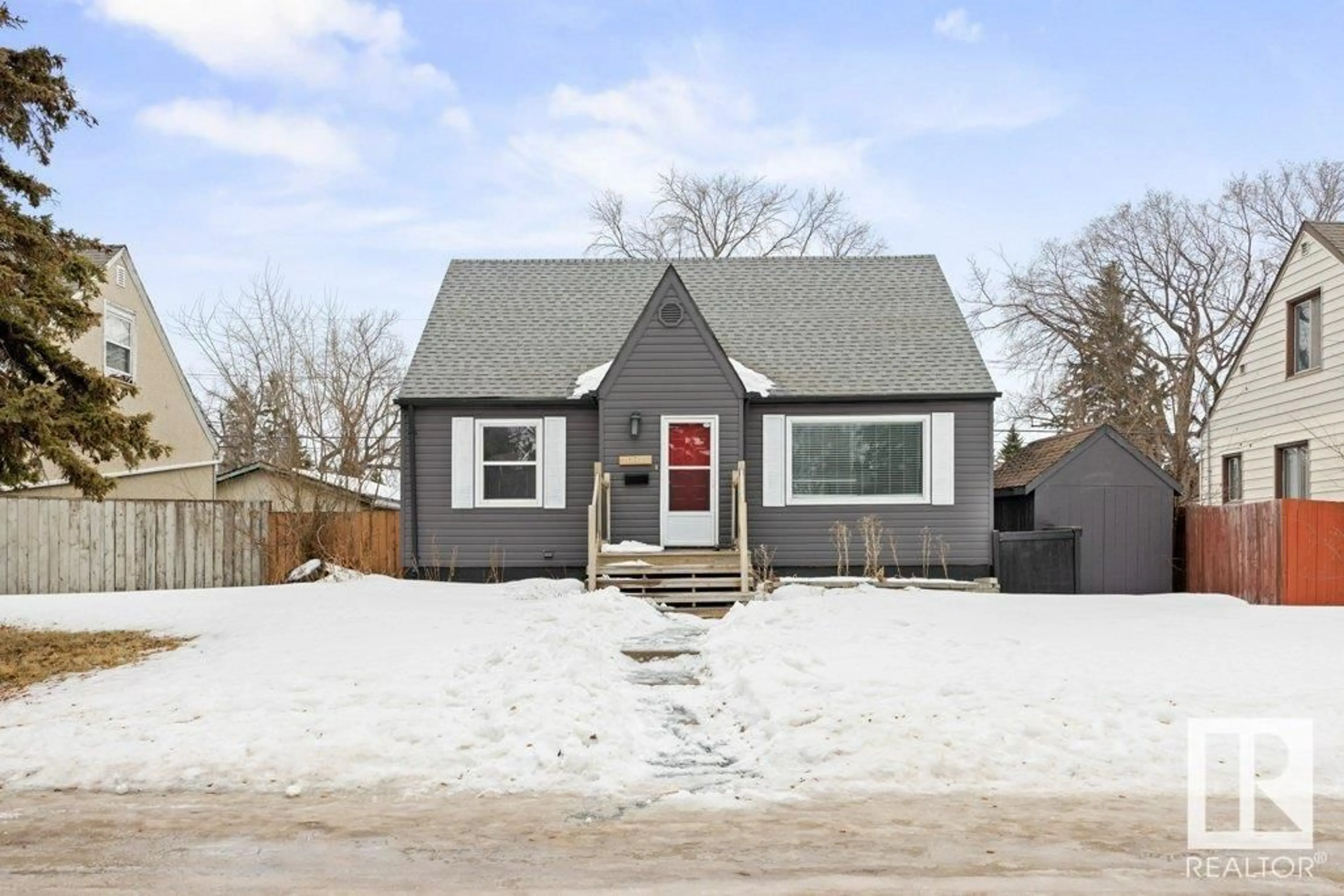 Home with vinyl exterior material, street for 10811 61 AV NW, Edmonton Alberta T6H1L9