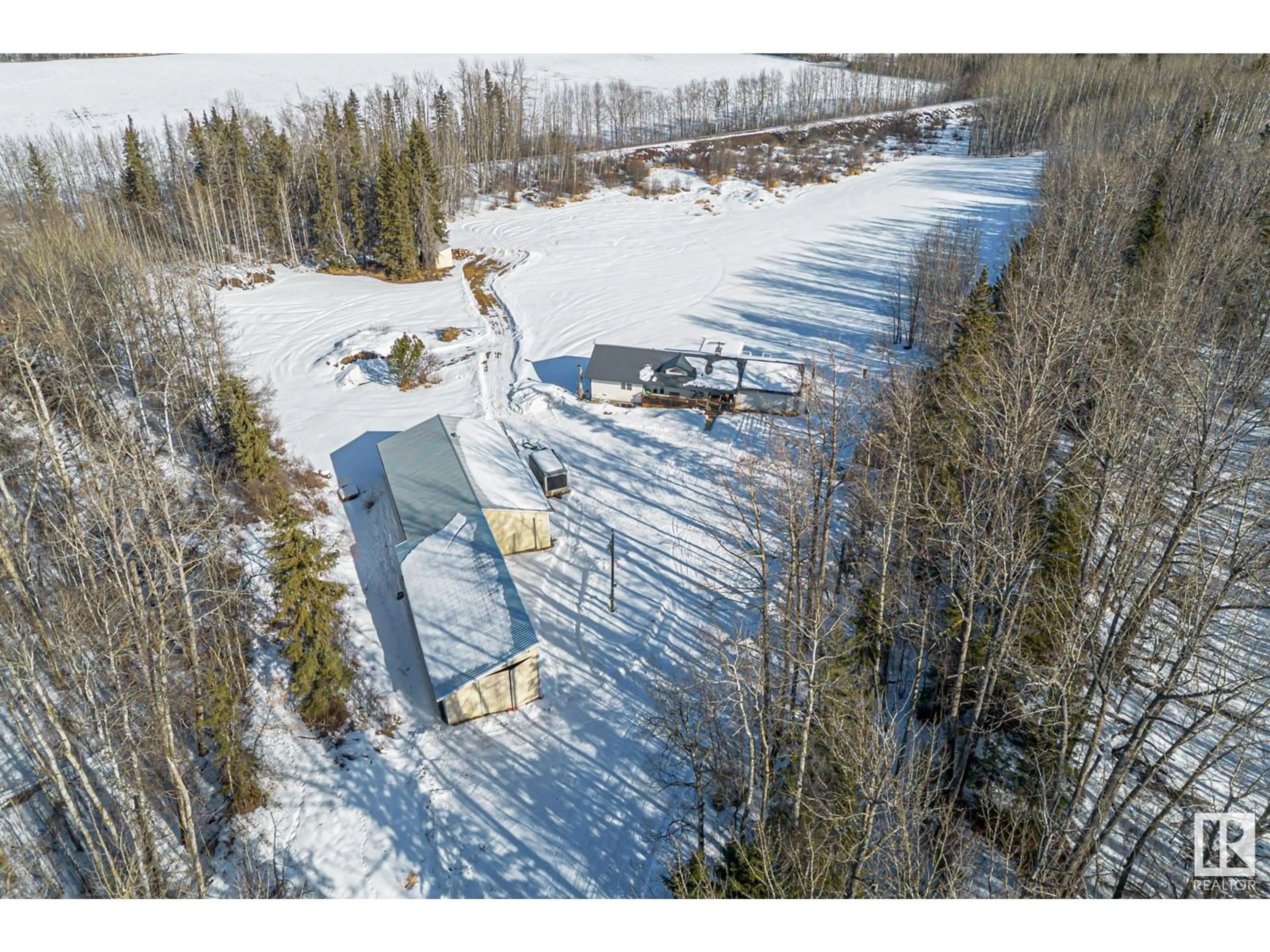 A pic from outside/outdoor area/front of a property/back of a property/a pic from drone, unknown for 2326 TWP RD 545, Rural Lac Ste. Anne County Alberta T0E1V0