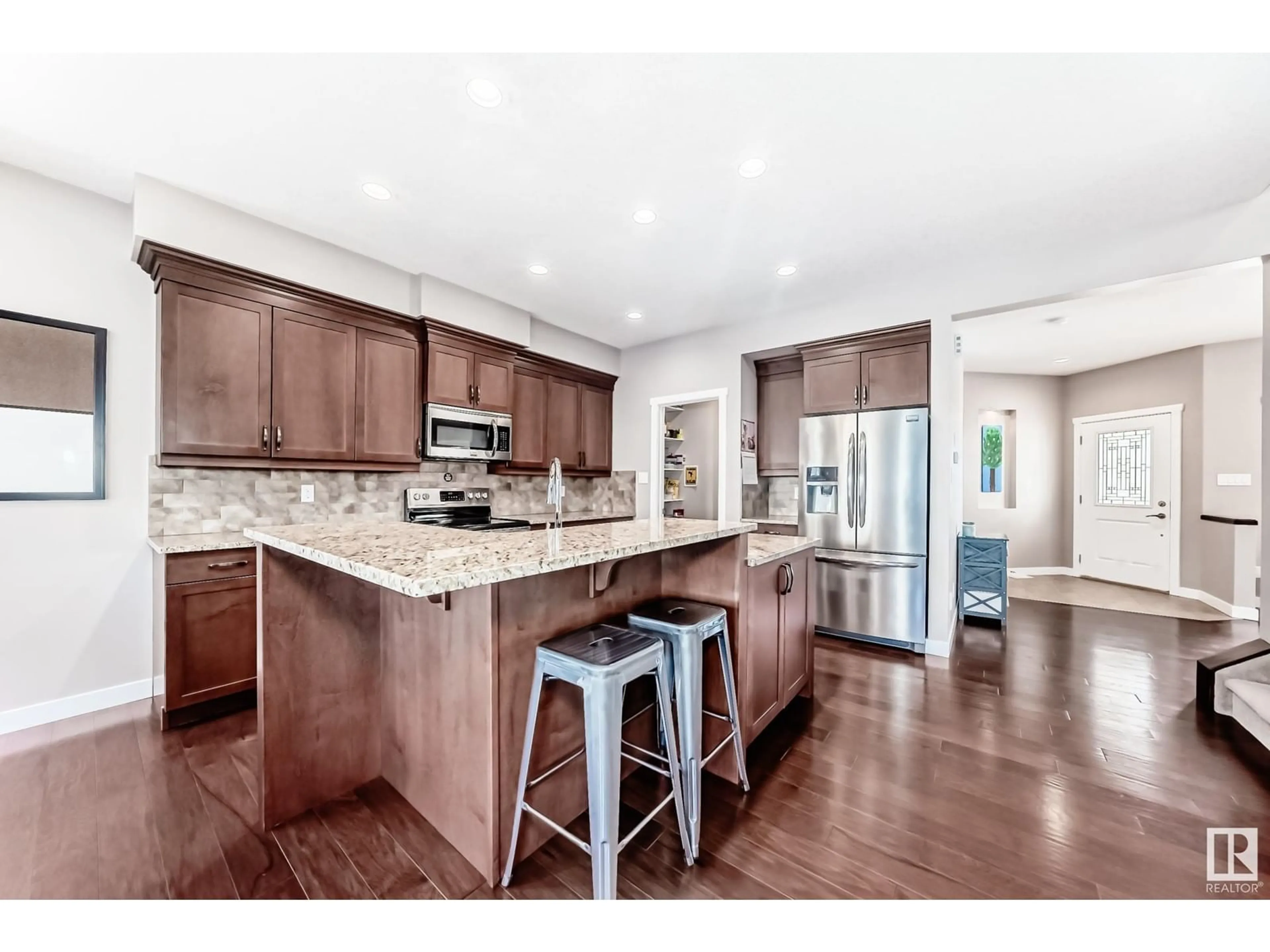 Open concept kitchen, unknown for 6042 167C AV NW, Edmonton Alberta T5Y0W7