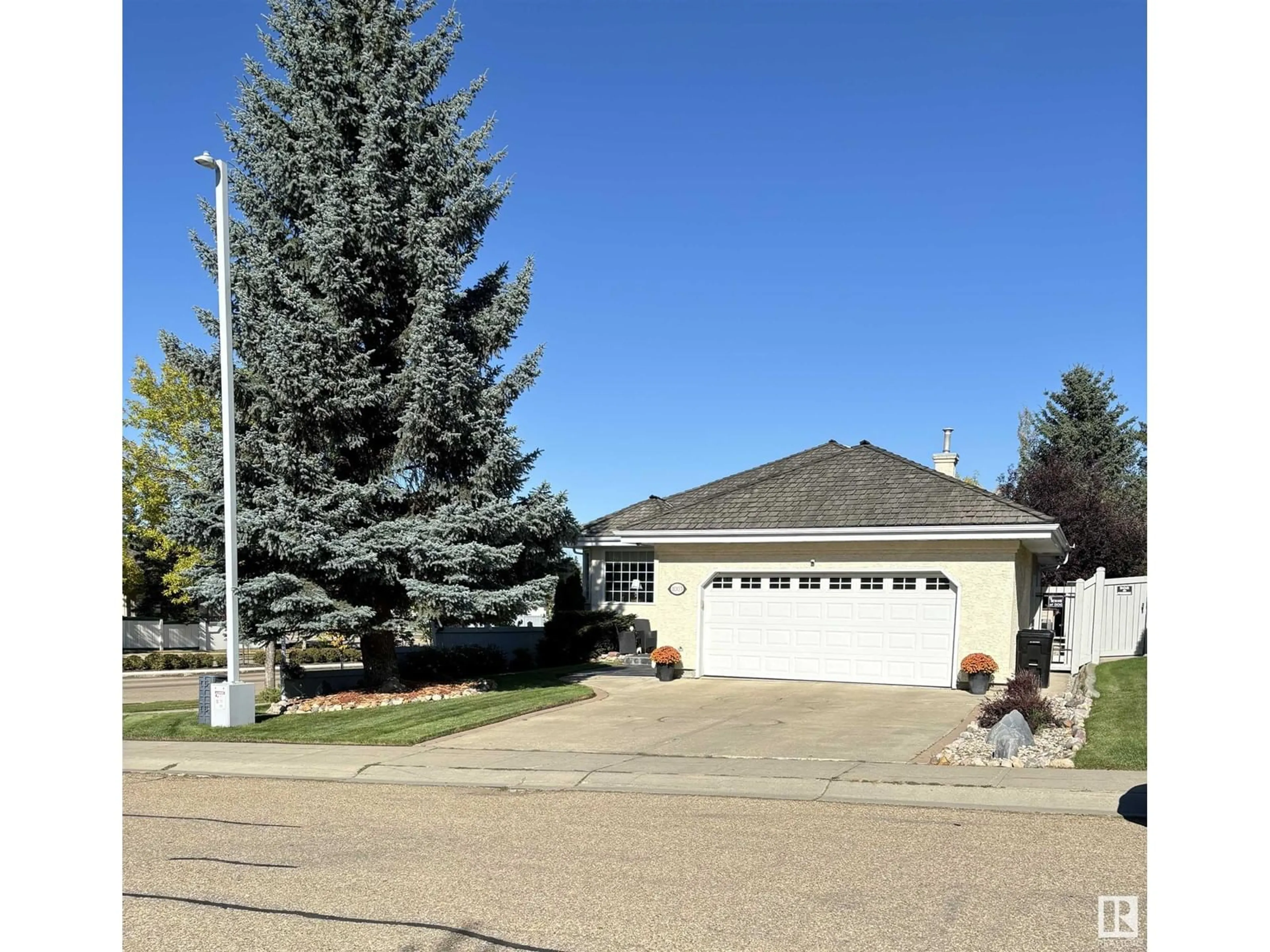 Home with vinyl exterior material, street for 1003 CARTER CREST RD NW, Edmonton Alberta T6R2K1