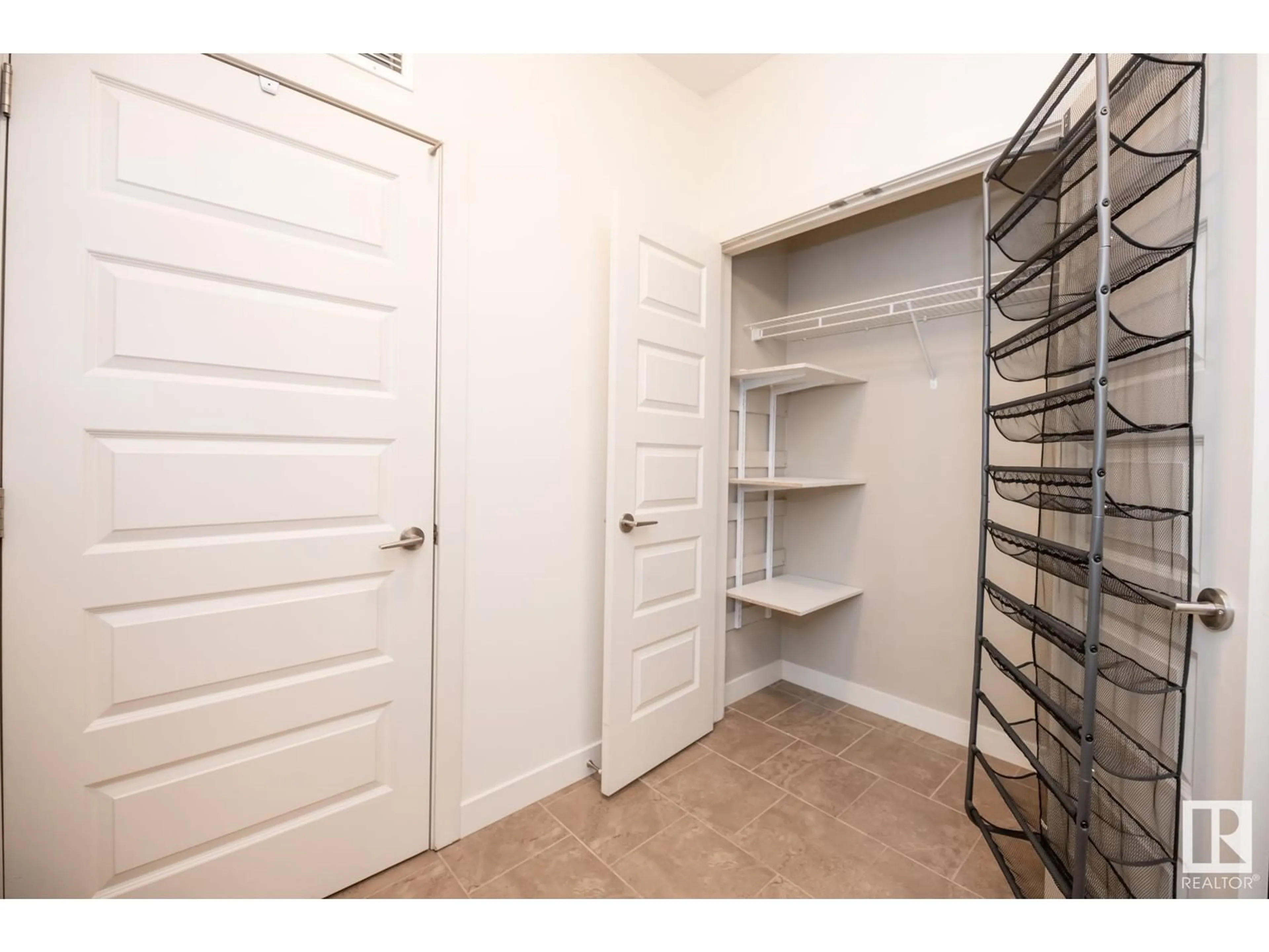 Storage room or clothes room or walk-in closet for #105 10520 56 AV NW, Edmonton Alberta T6H0X7