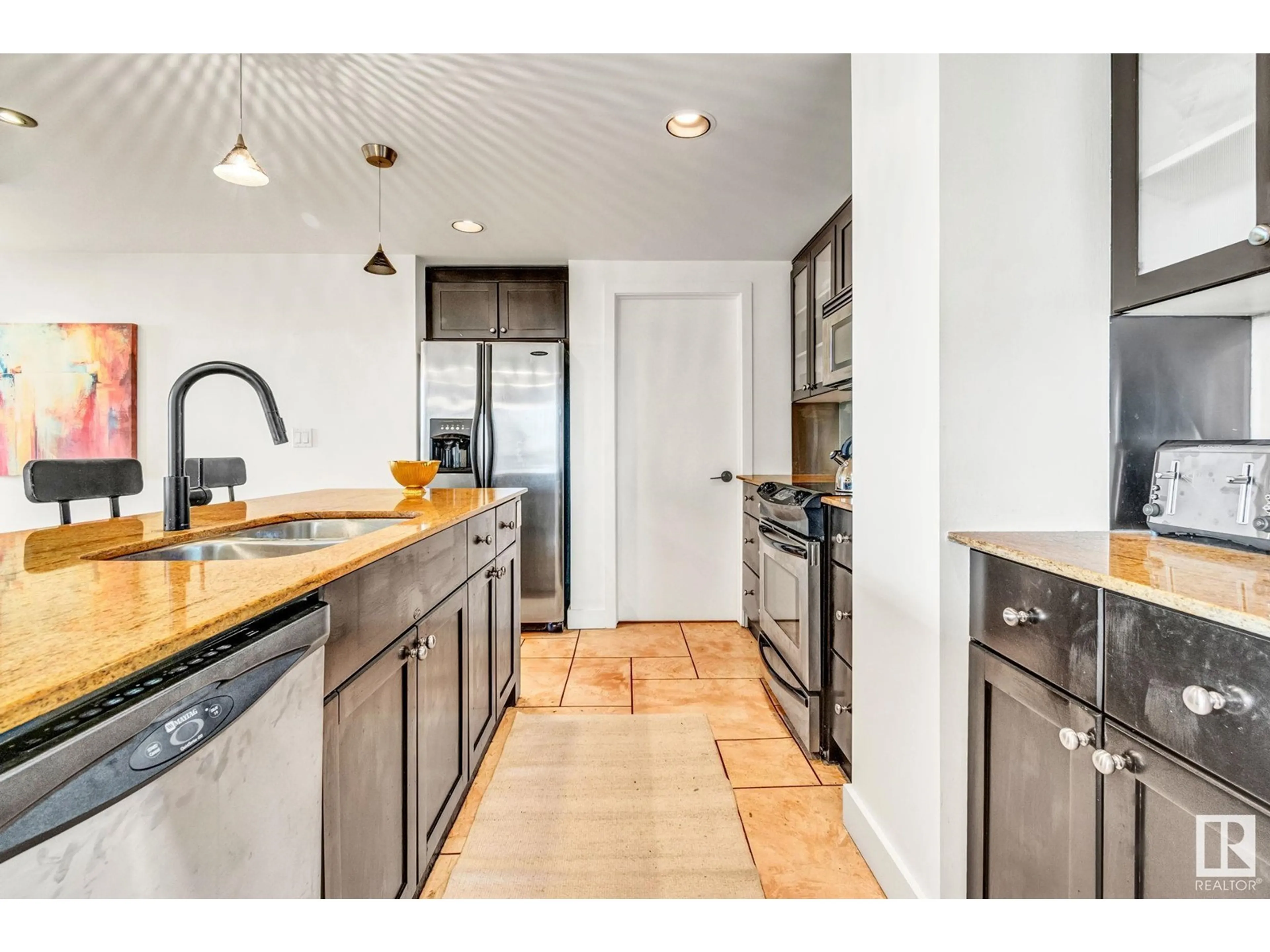 Open concept kitchen, ceramic/tile floor for #403 - 10028 119 ST NW, Edmonton Alberta T5K1Y8