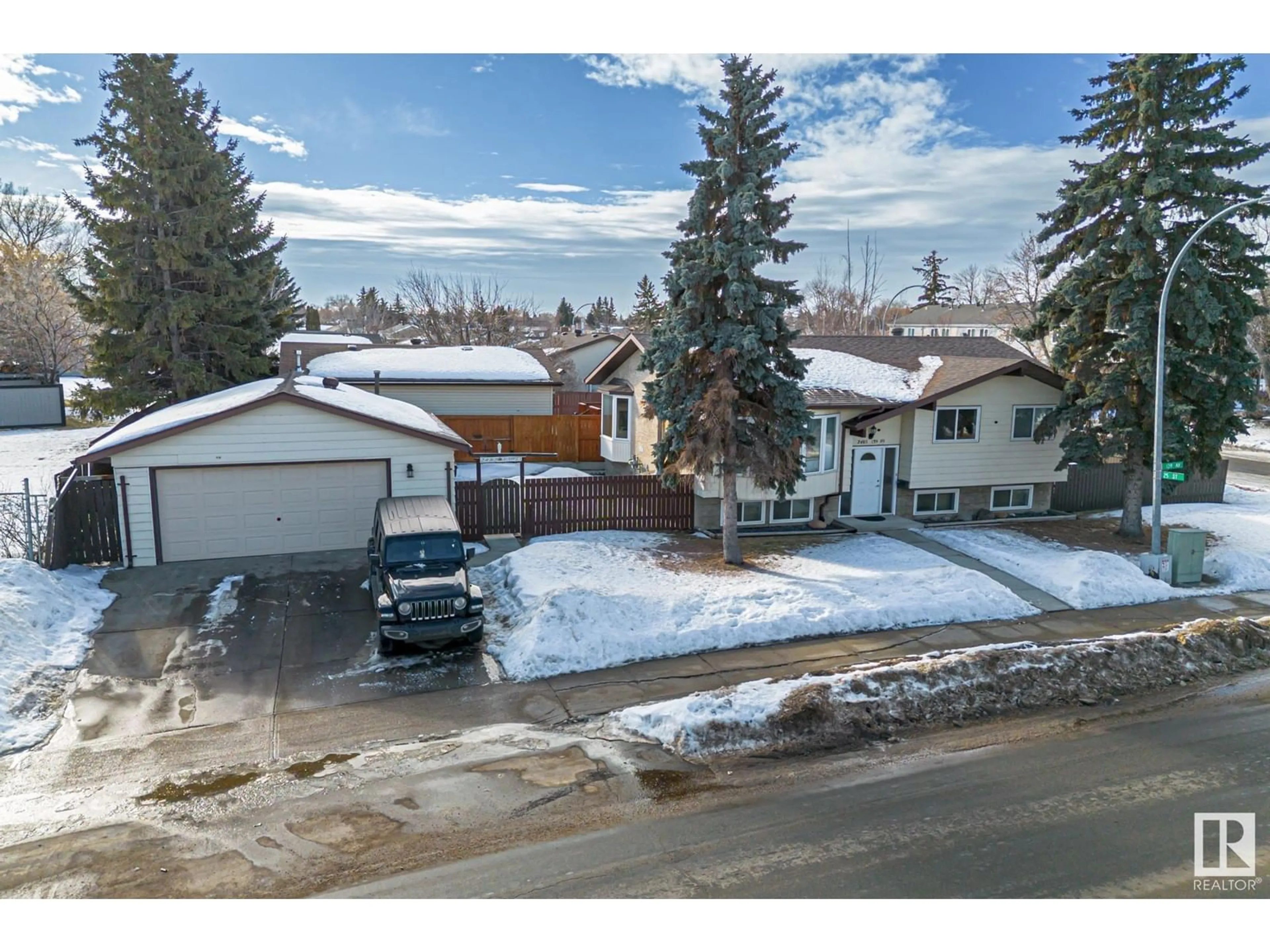 A pic from outside/outdoor area/front of a property/back of a property/a pic from drone, street for 2485 139 AV NW, Edmonton Alberta T5Y1J5