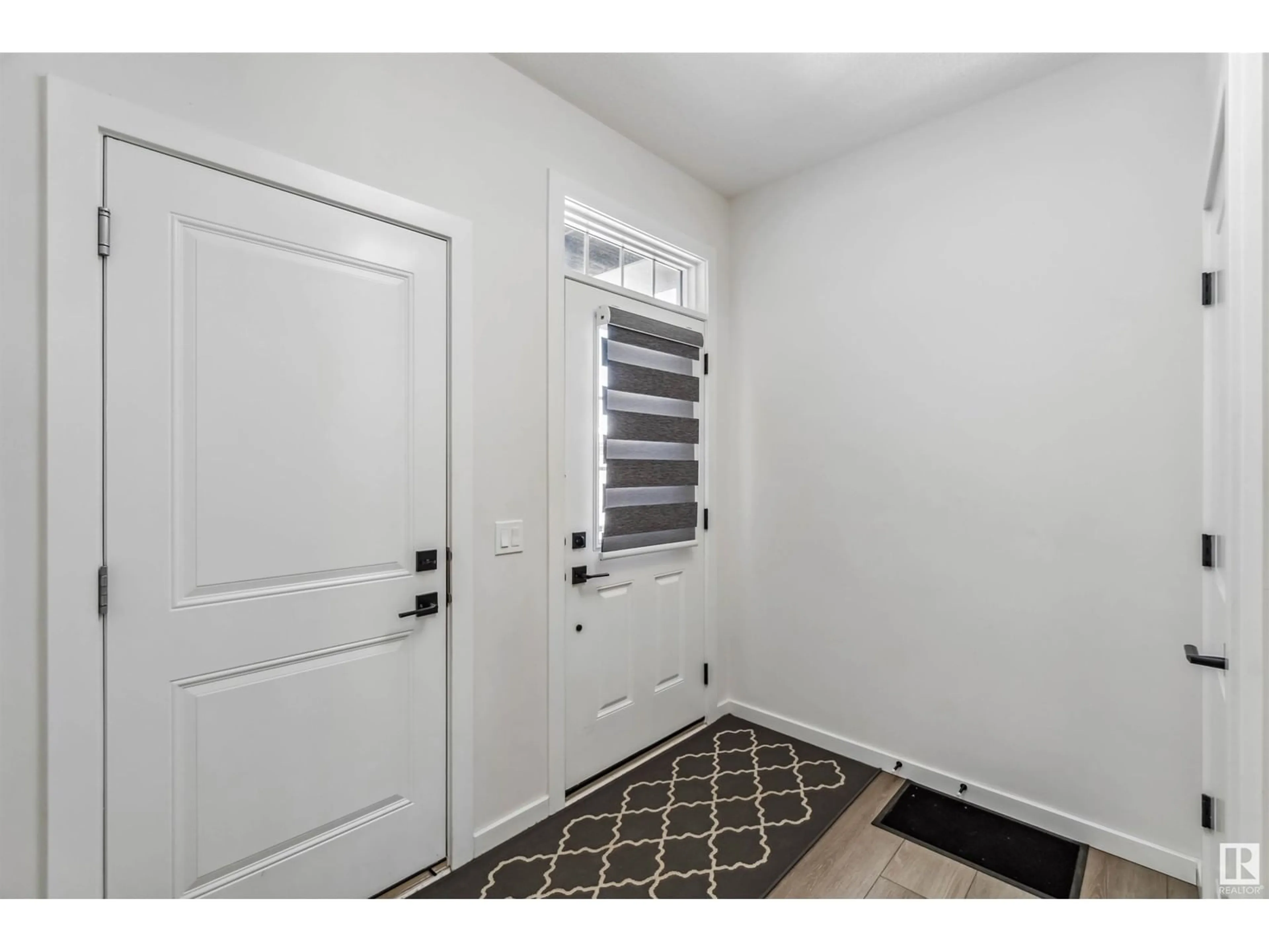 Indoor entryway for 4335 Hawthorn Landing SW, Edmonton Alberta T6X2Y9