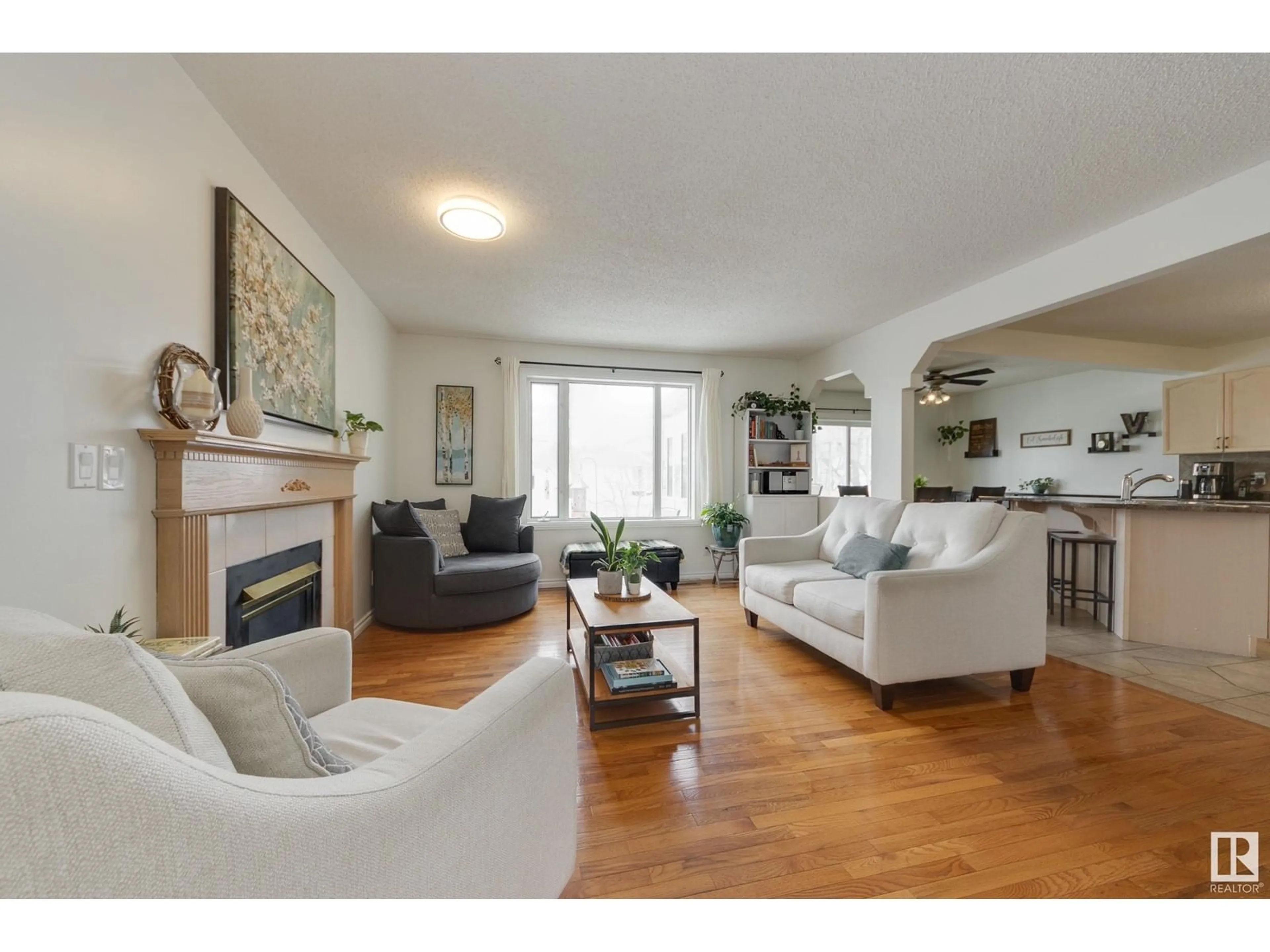 Living room with furniture, wood/laminate floor for 62 HARCOURT CR, St. Albert Alberta T8N6K7