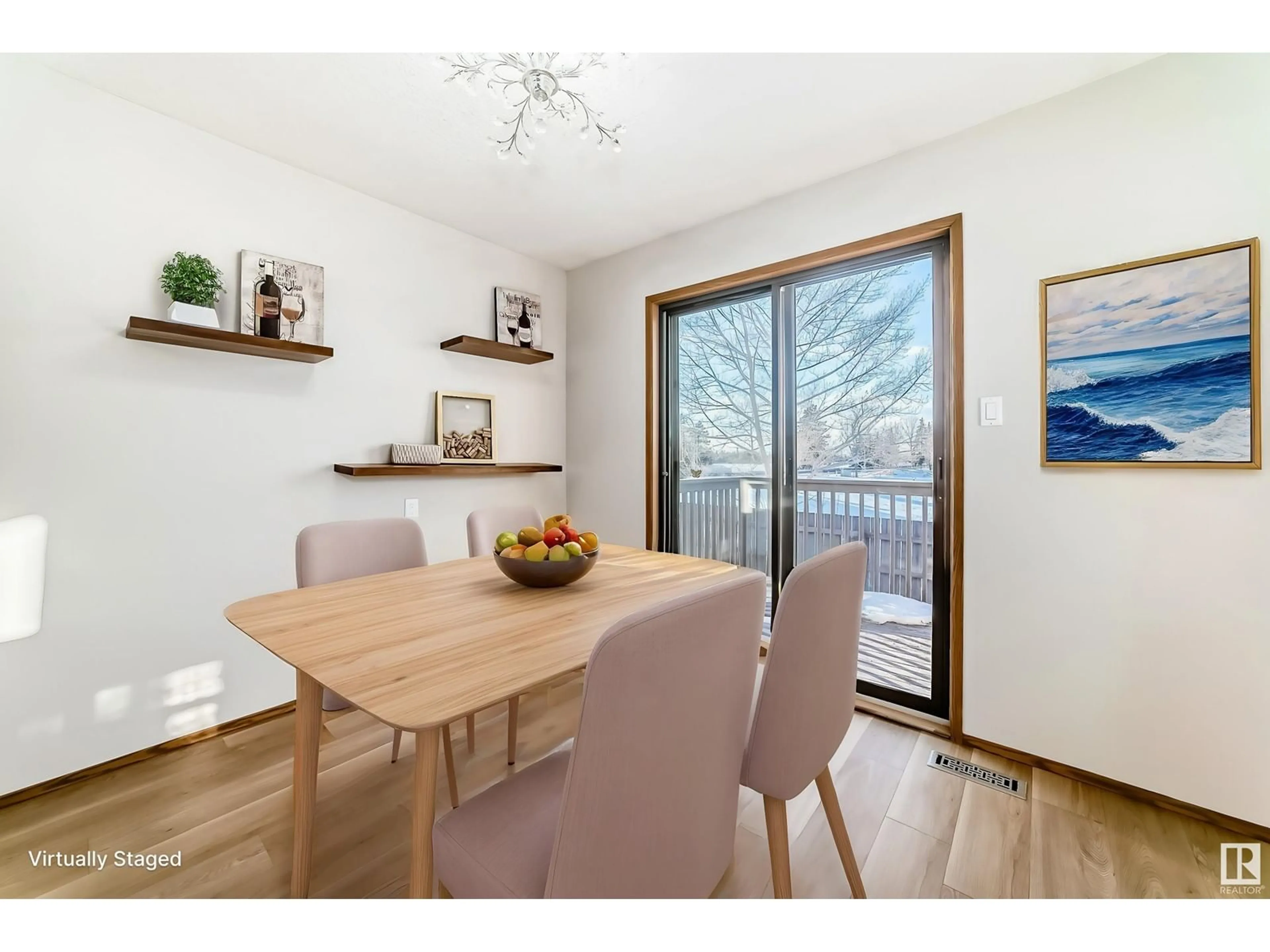 Dining room, wood/laminate floor for 10860 11 AV NW, Edmonton Alberta T6J6H8