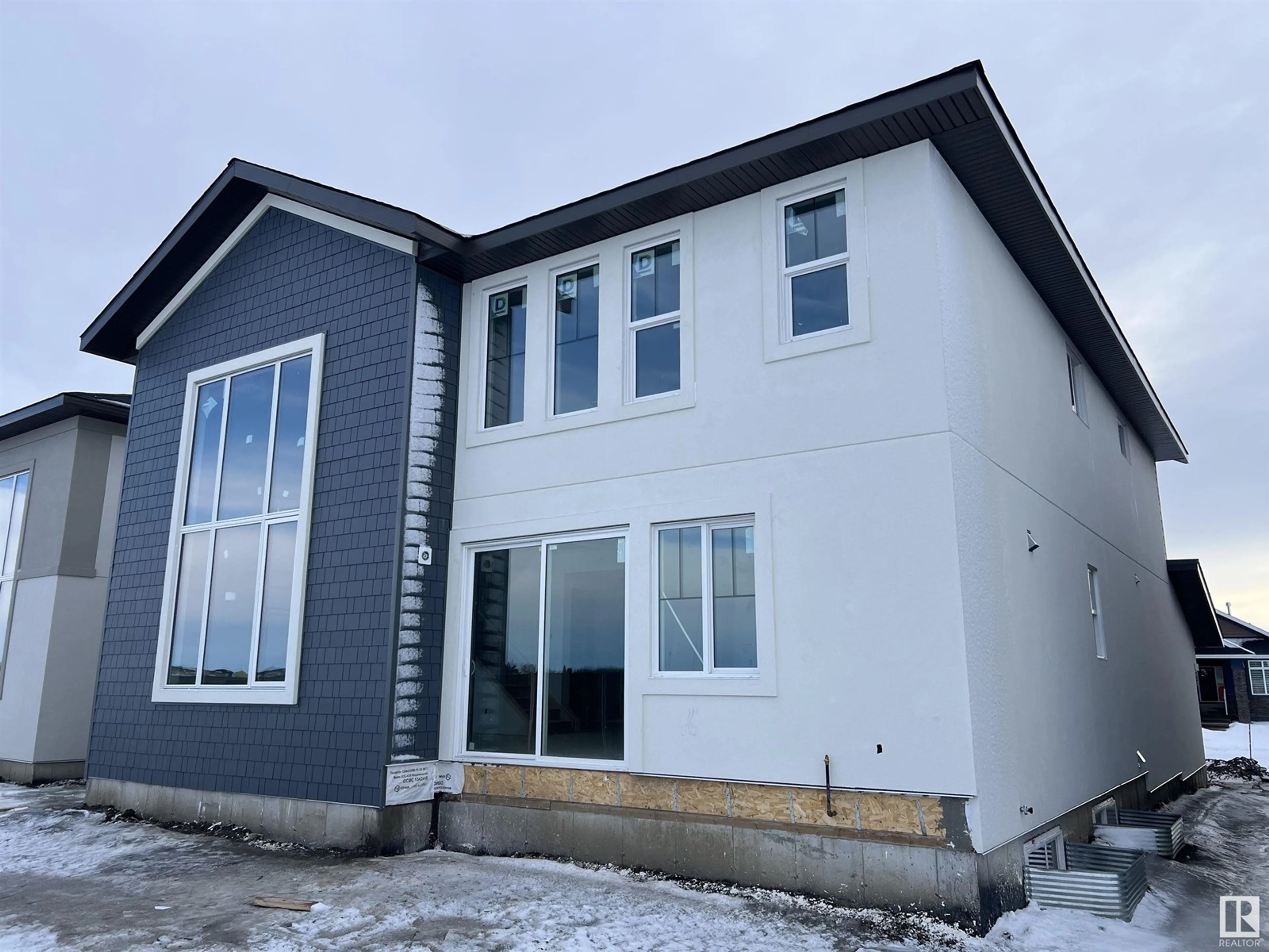 Home with vinyl exterior material, building for 63 JUBILATON DR, St. Albert Alberta T8N7W7