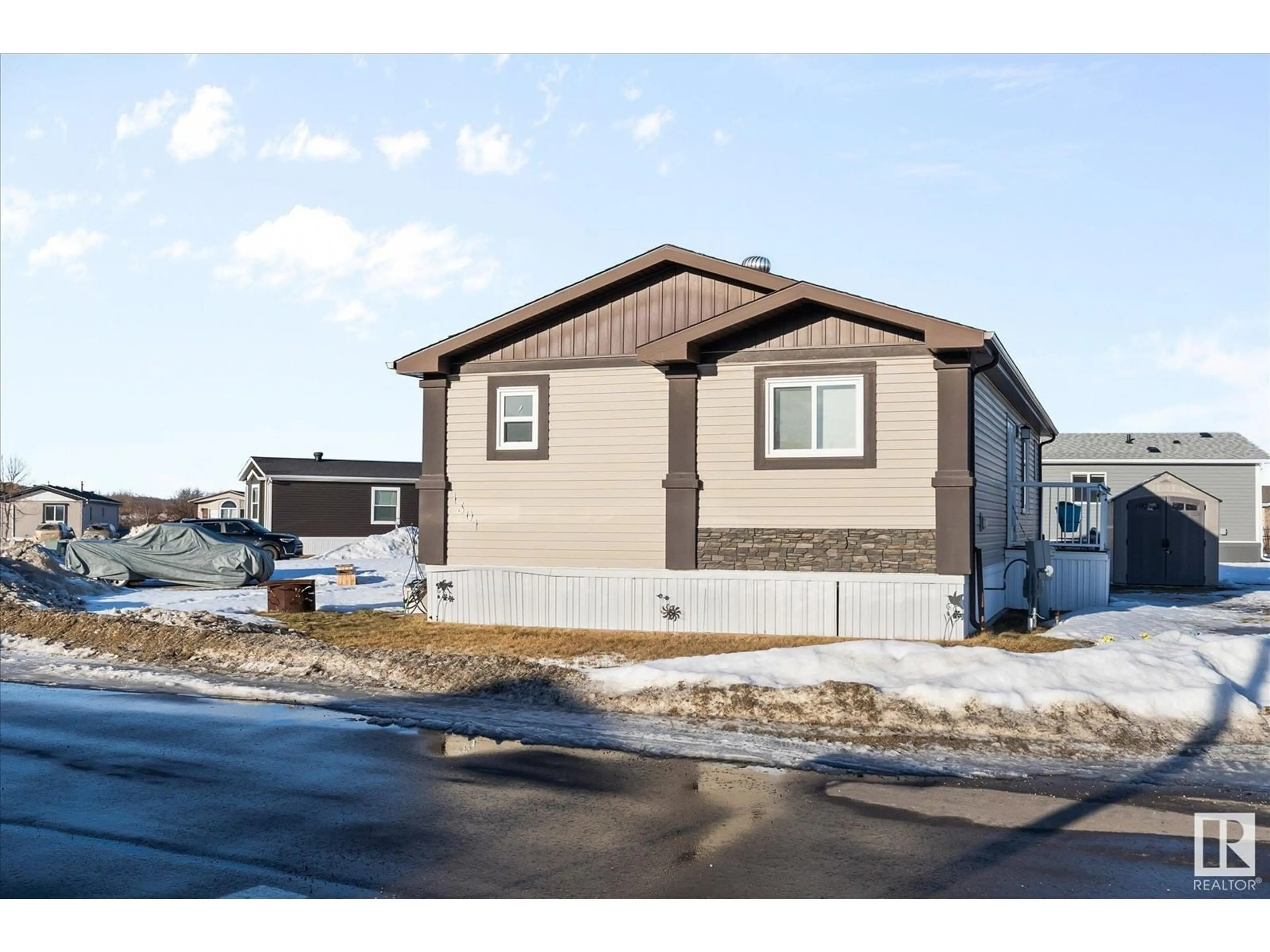 Home with vinyl exterior material, street for 1301 53222 Range Road 272, Rural Parkland County Alberta T7X3X6