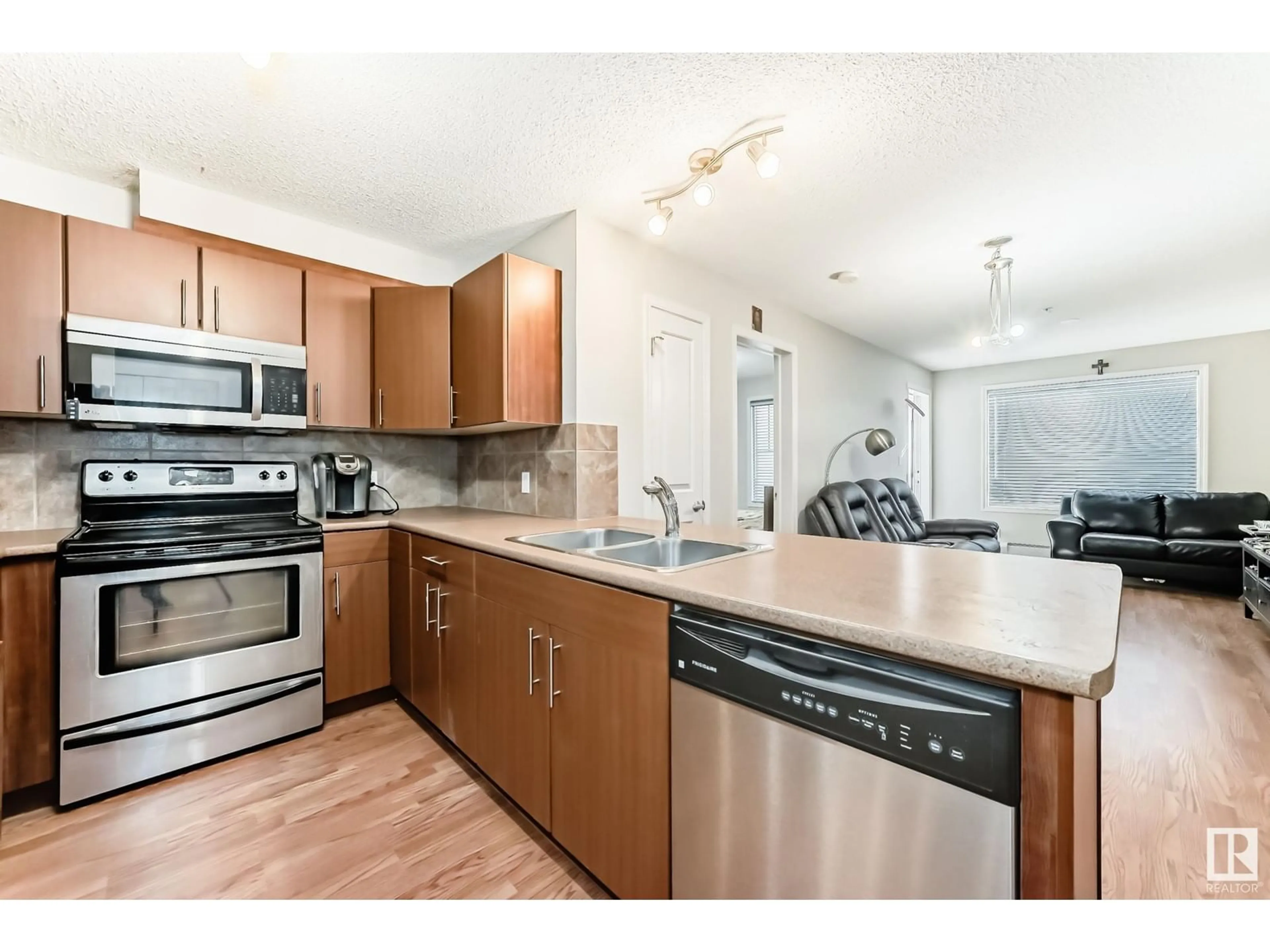 Open concept kitchen, unknown for #213 105 AMBLESIDE DR SW, Edmonton Alberta T6W0J4