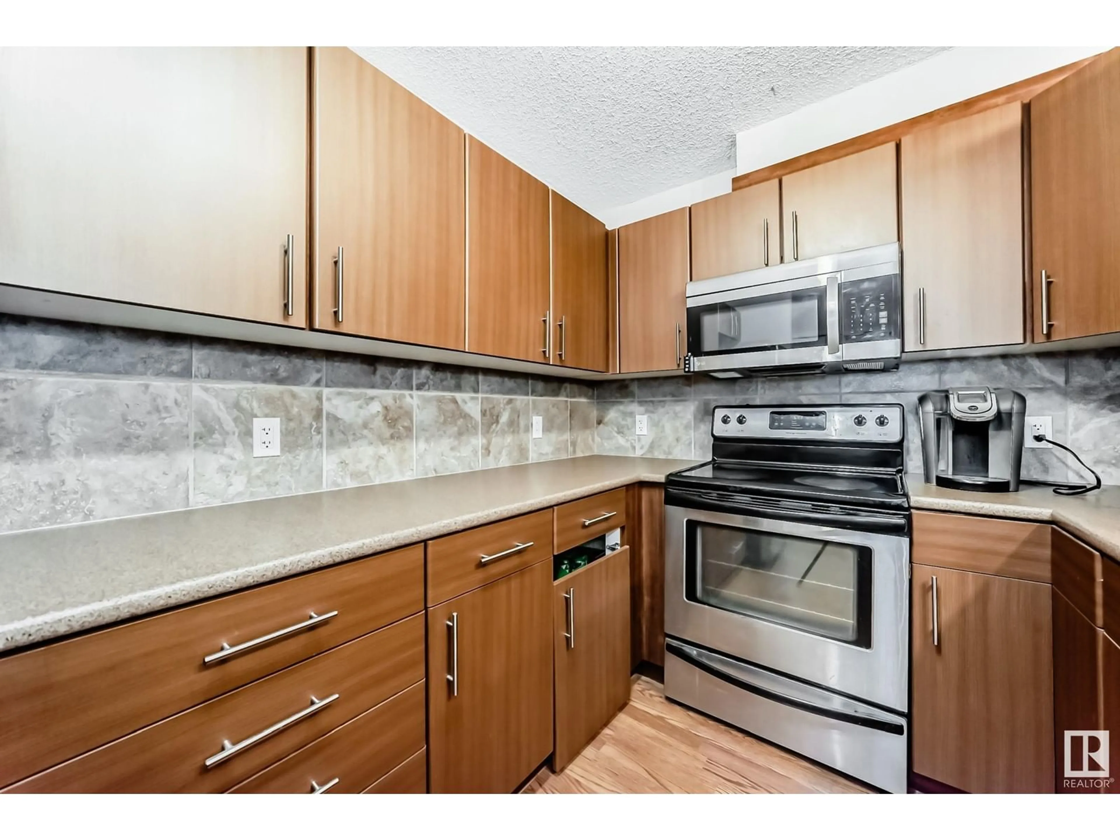 Standard kitchen, unknown for #213 105 AMBLESIDE DR SW, Edmonton Alberta T6W0J4