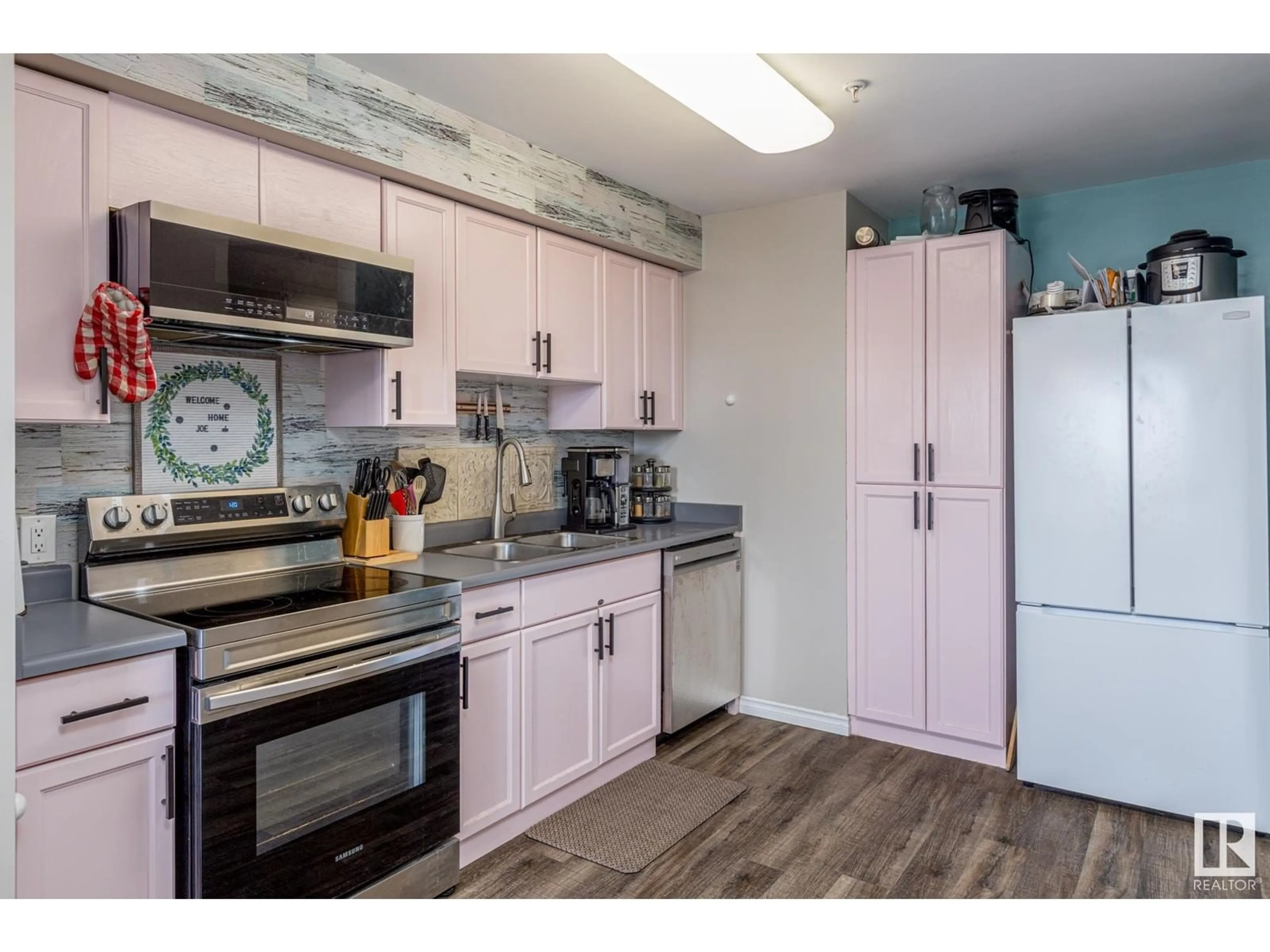 Standard kitchen, wood/laminate floor for #203 105 MCKENNEY AV, St. Albert Alberta T8N2Y2