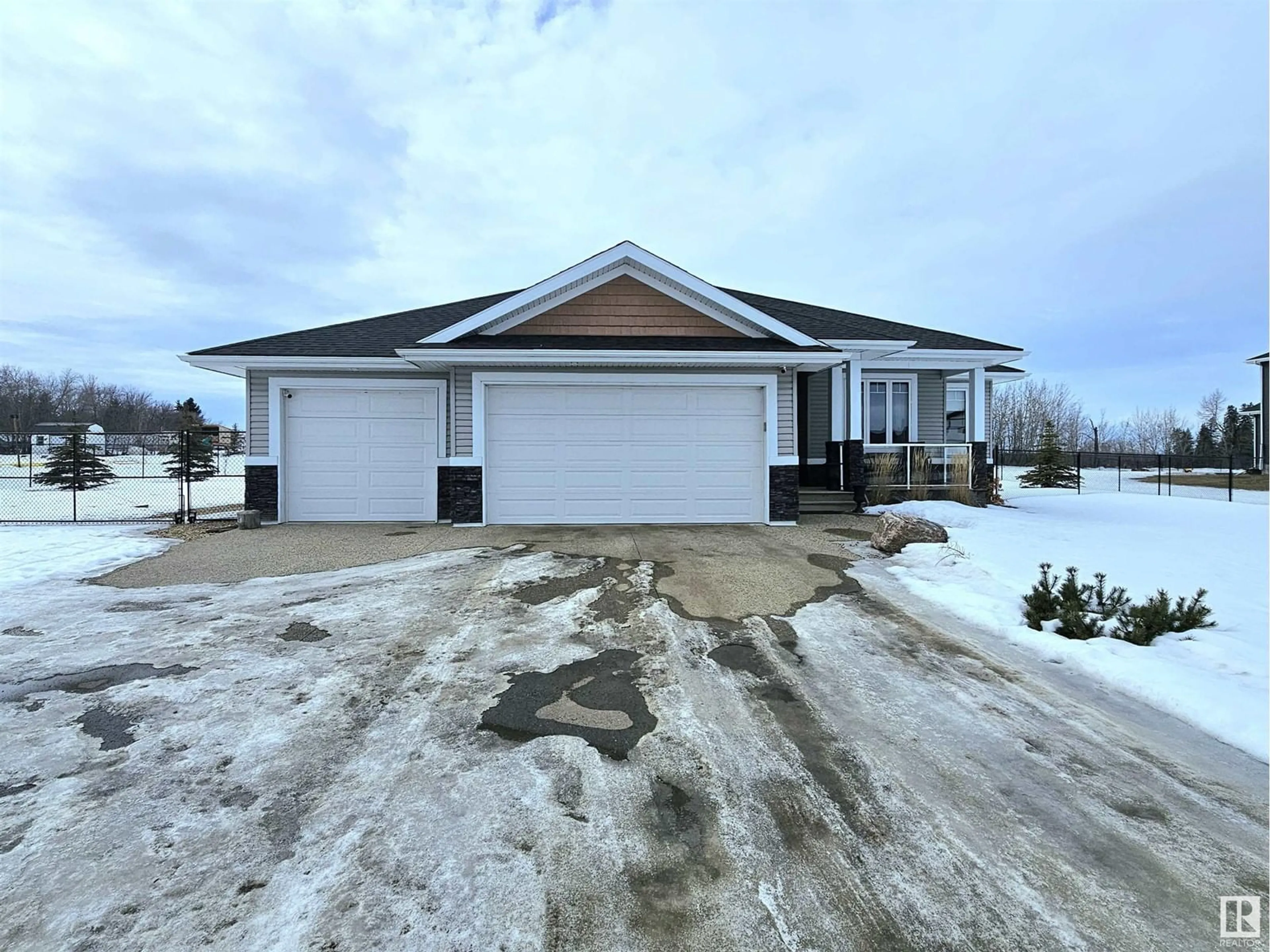 A pic from outside/outdoor area/front of a property/back of a property/a pic from drone, street for 44 26409 TWP ROAD 532 A, Rural Parkland County Alberta T7X4M1