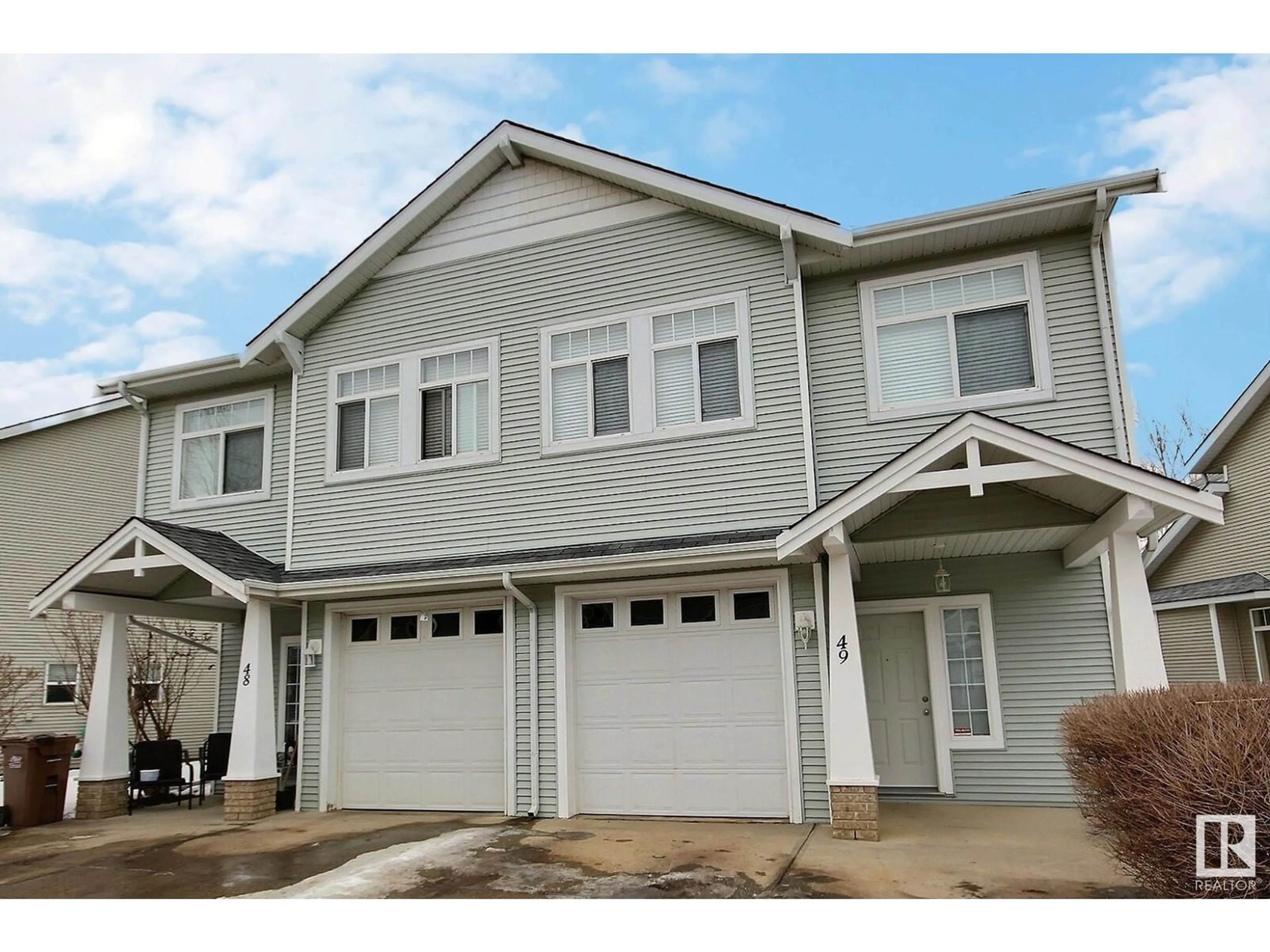 Home with vinyl exterior material, street for #49 200 ERIN RIDGE DR, St. Albert Alberta T8N7E2