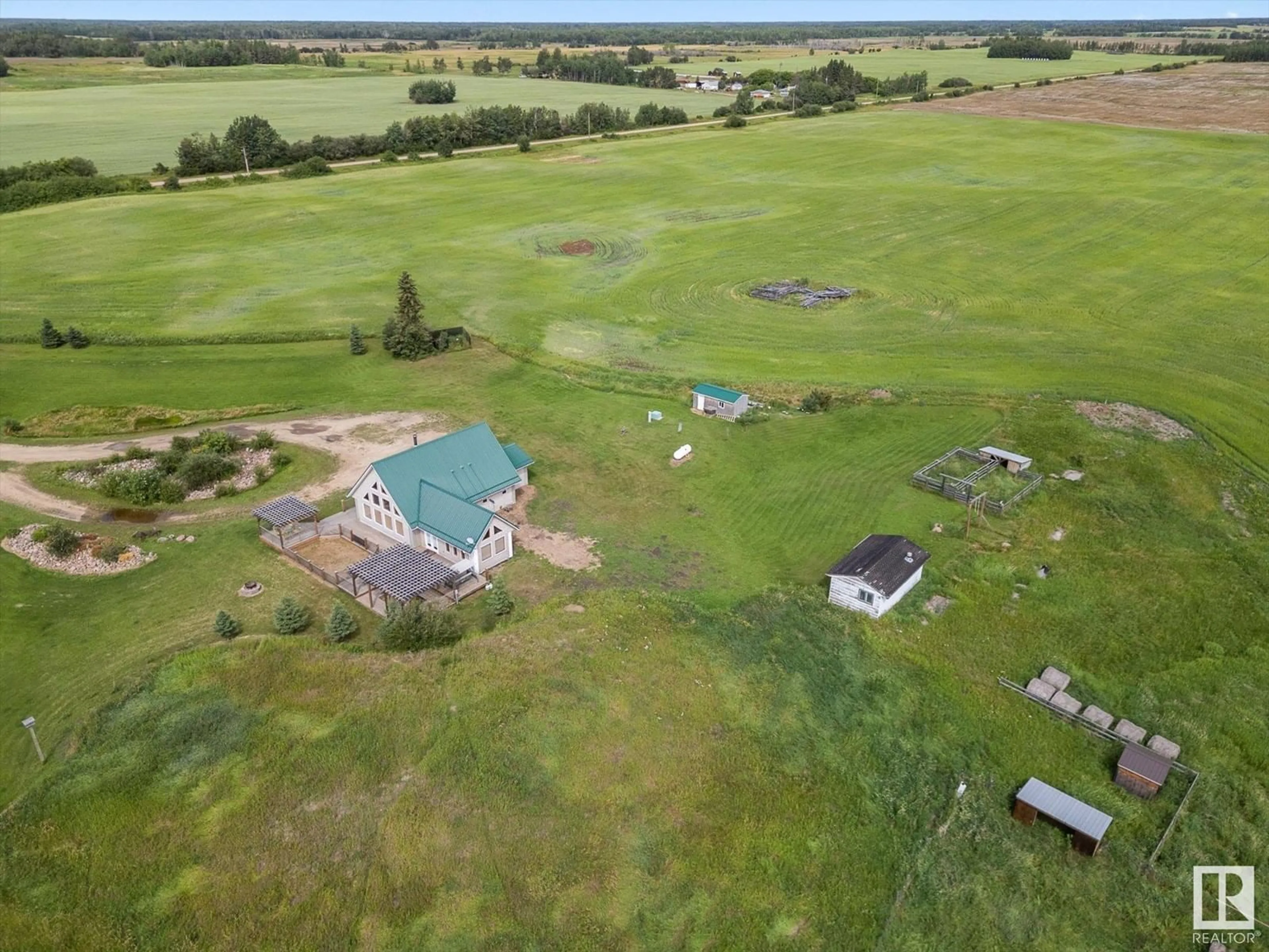 A pic from outside/outdoor area/front of a property/back of a property/a pic from drone, water/lake/river/ocean view for 221 RR NORTH OF TWNSHP, Rural Thorhild County Alberta T0A3J0