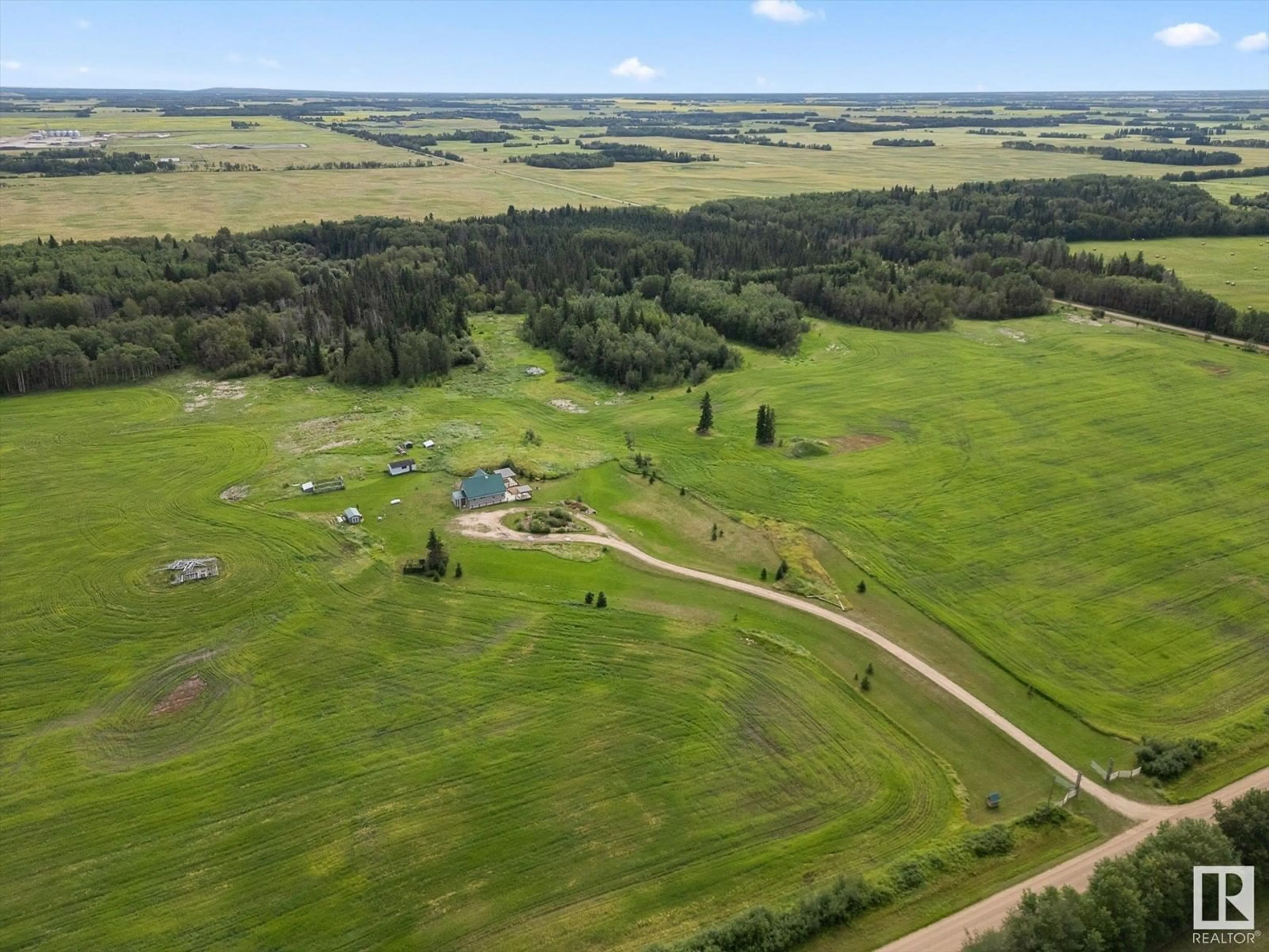 A pic from outside/outdoor area/front of a property/back of a property/a pic from drone, unknown for 221 RR NORTH OF TWNSHP, Rural Thorhild County Alberta T0A3J0