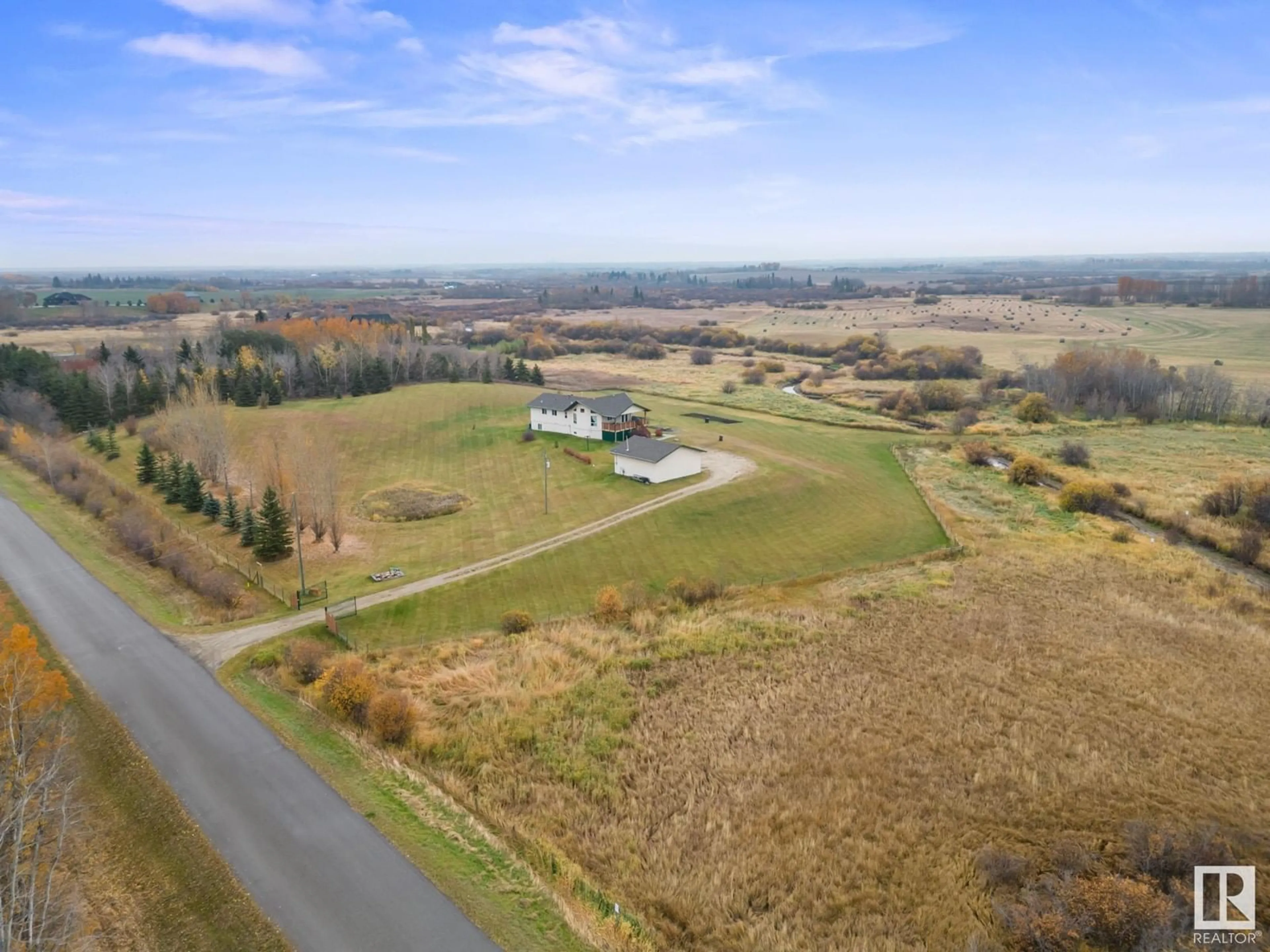 A pic from outside/outdoor area/front of a property/back of a property/a pic from drone, unknown for 27121B TWP ROAD 534, Rural Parkland County Alberta T7X3M6